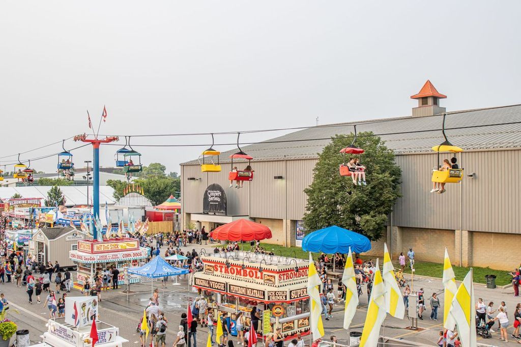 An aerial view of the Ohio State Fairgrounds, with the sky glider in the background.