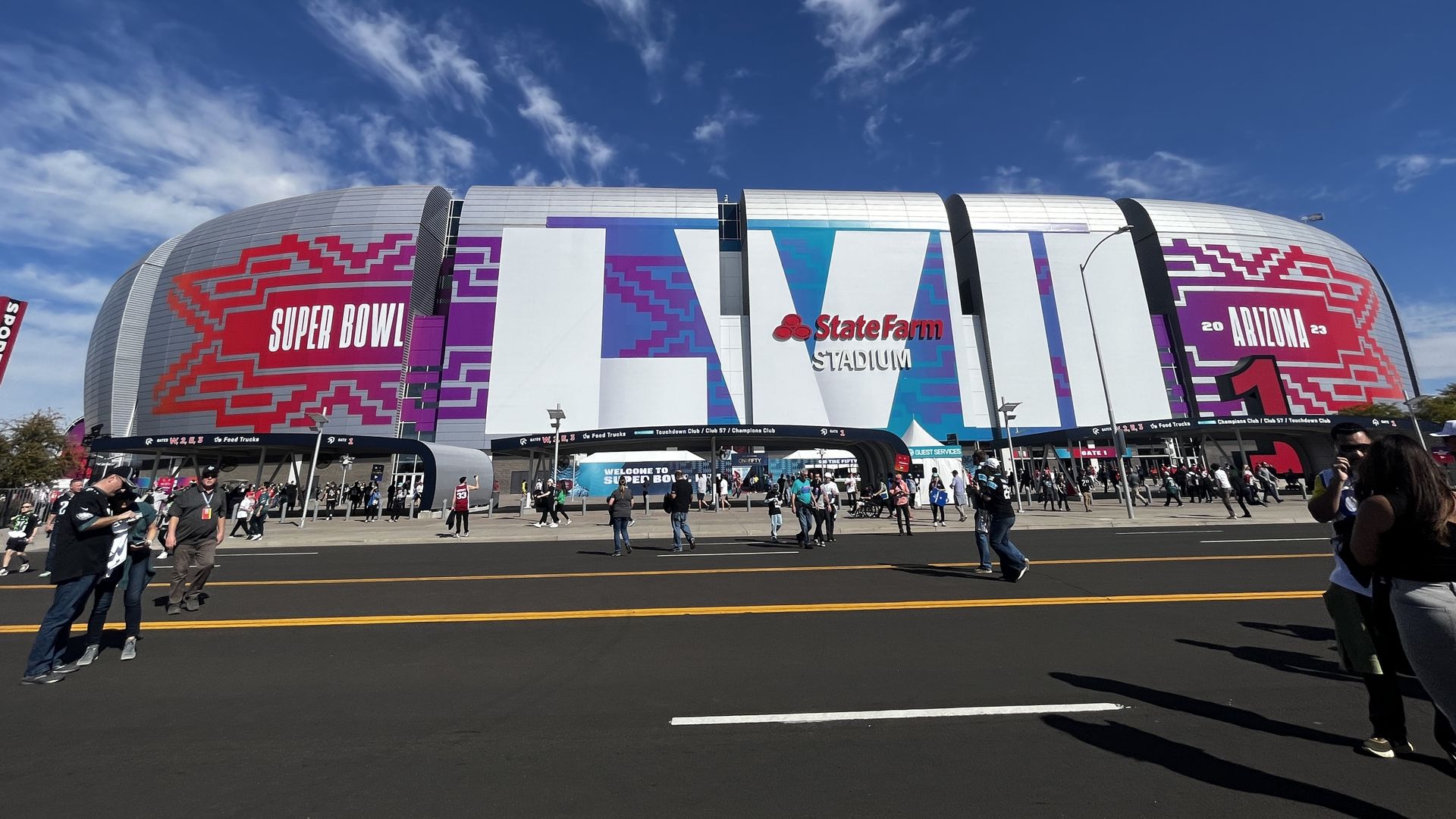 State Farm Stadium with the Super Bowl 57 logo on the side.