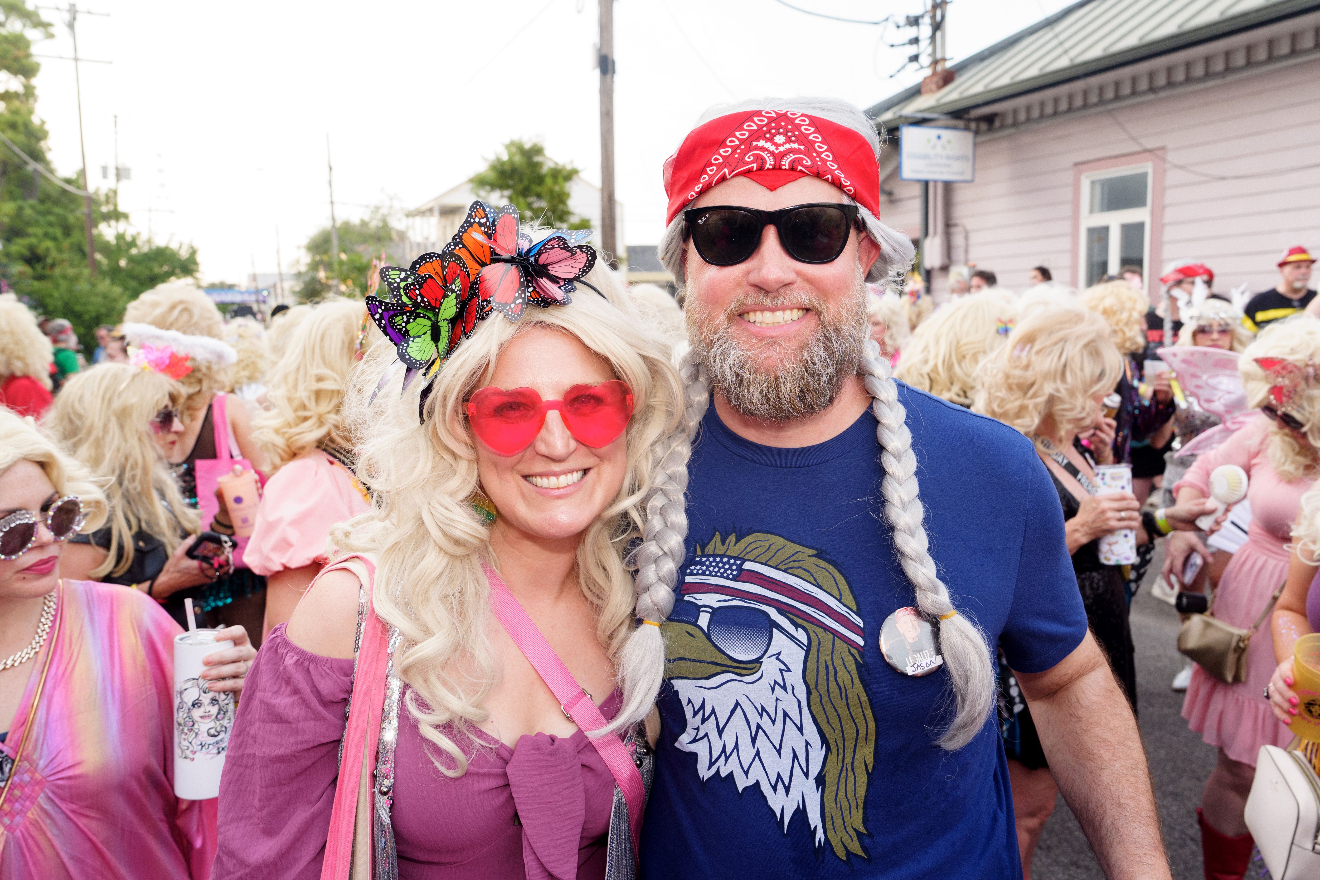 Image shows people dressed as Dolly Parton.