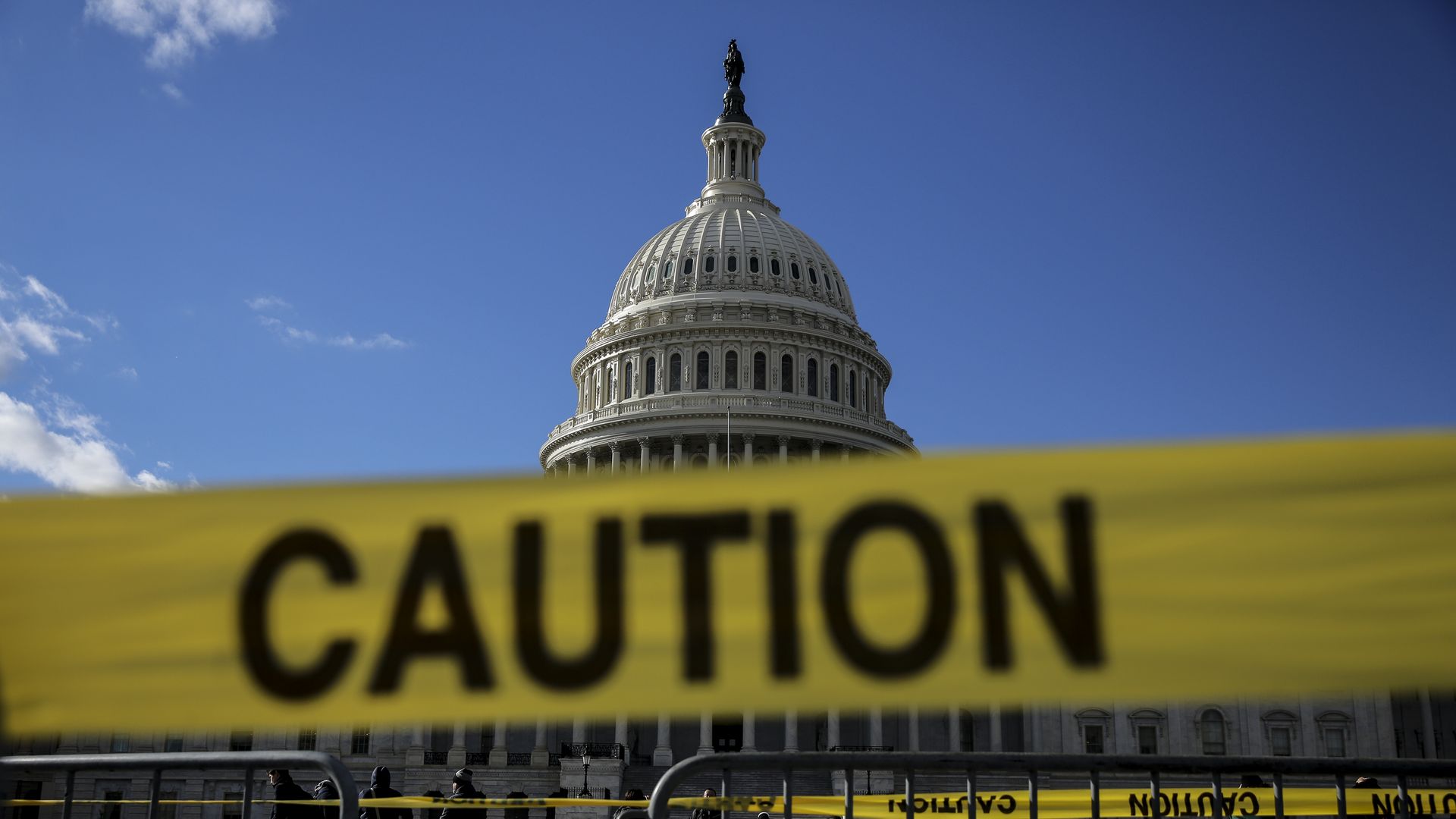 Capitol Hill with caution tape near entrances