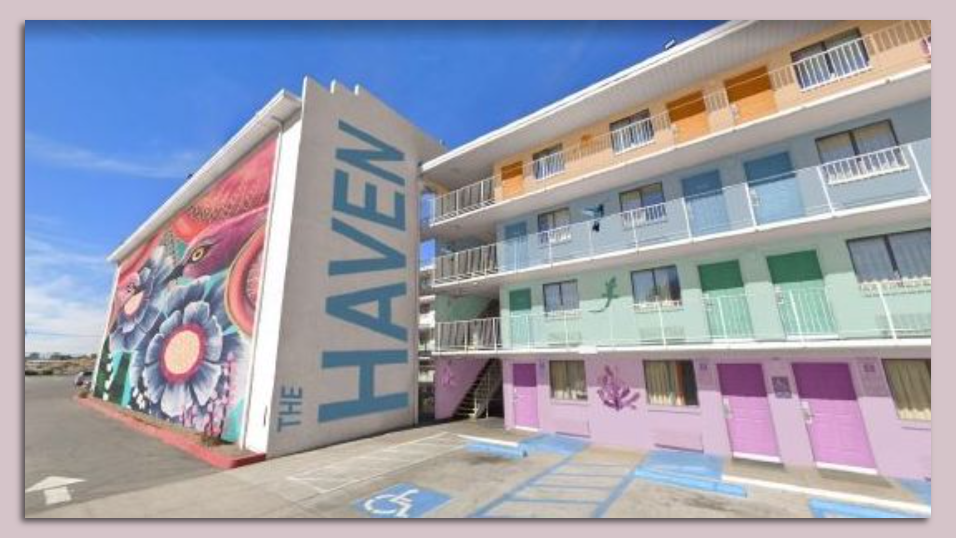 A rendering of a hotel that is brightly colored and says "The Haven."