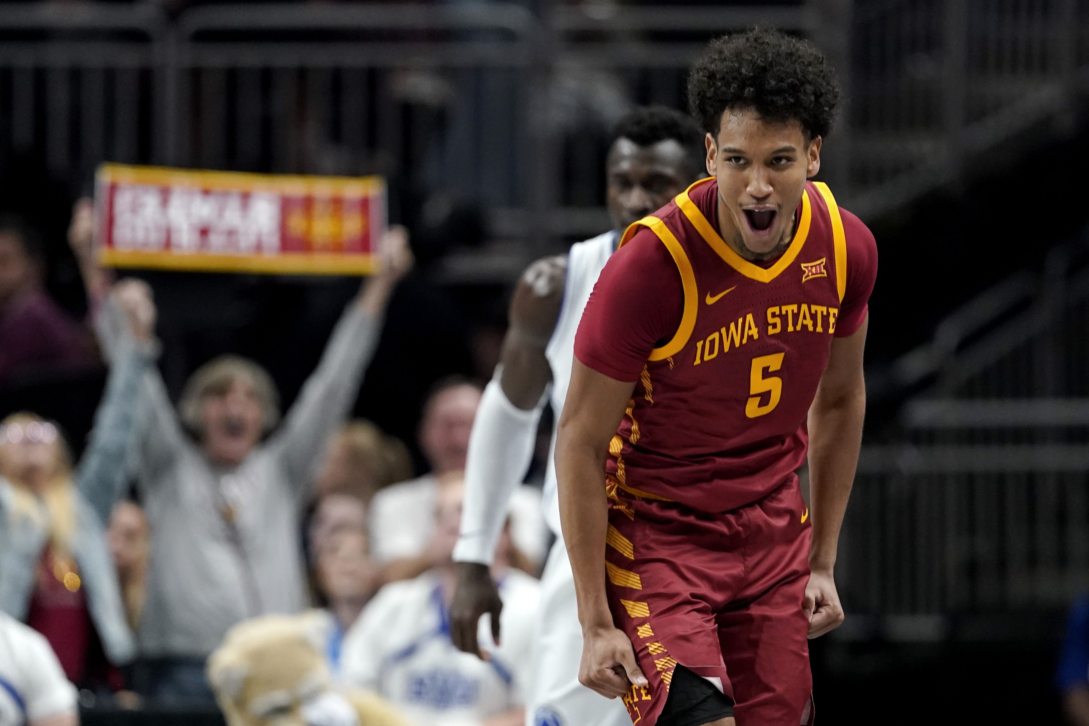 Photo of a basketball player celebrating during a game. 