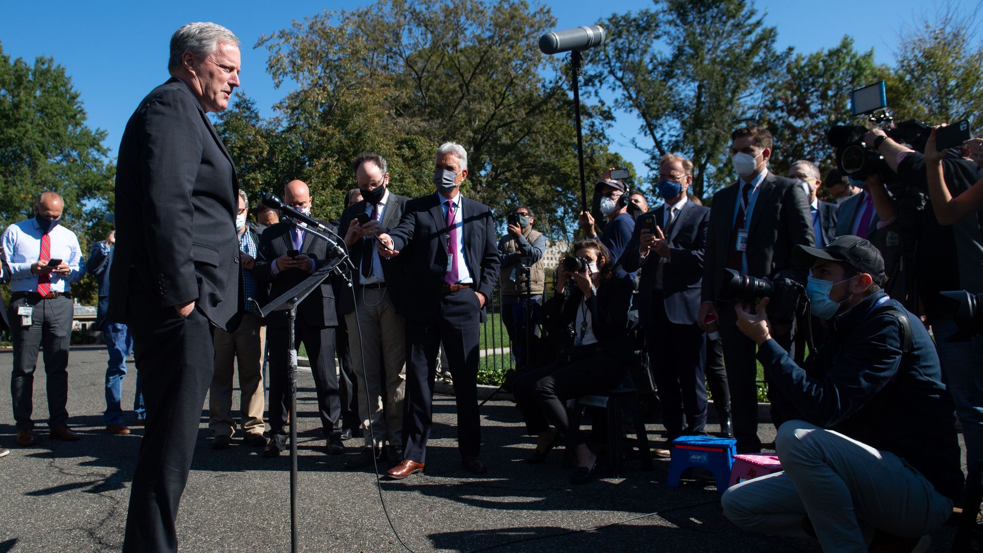 Chief of Staff Mark Meadows speaks to reporters Friday morning. He is not wearing a mask