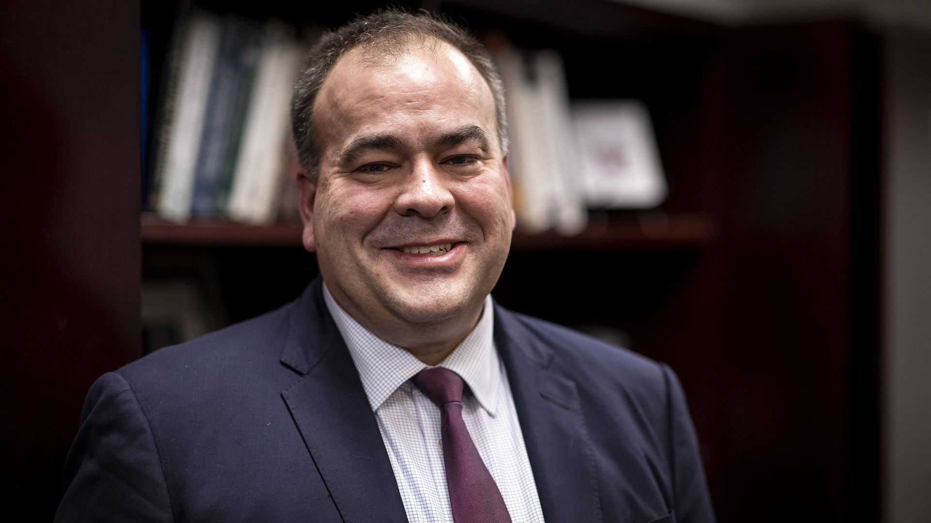 Photo of a man smiling. 