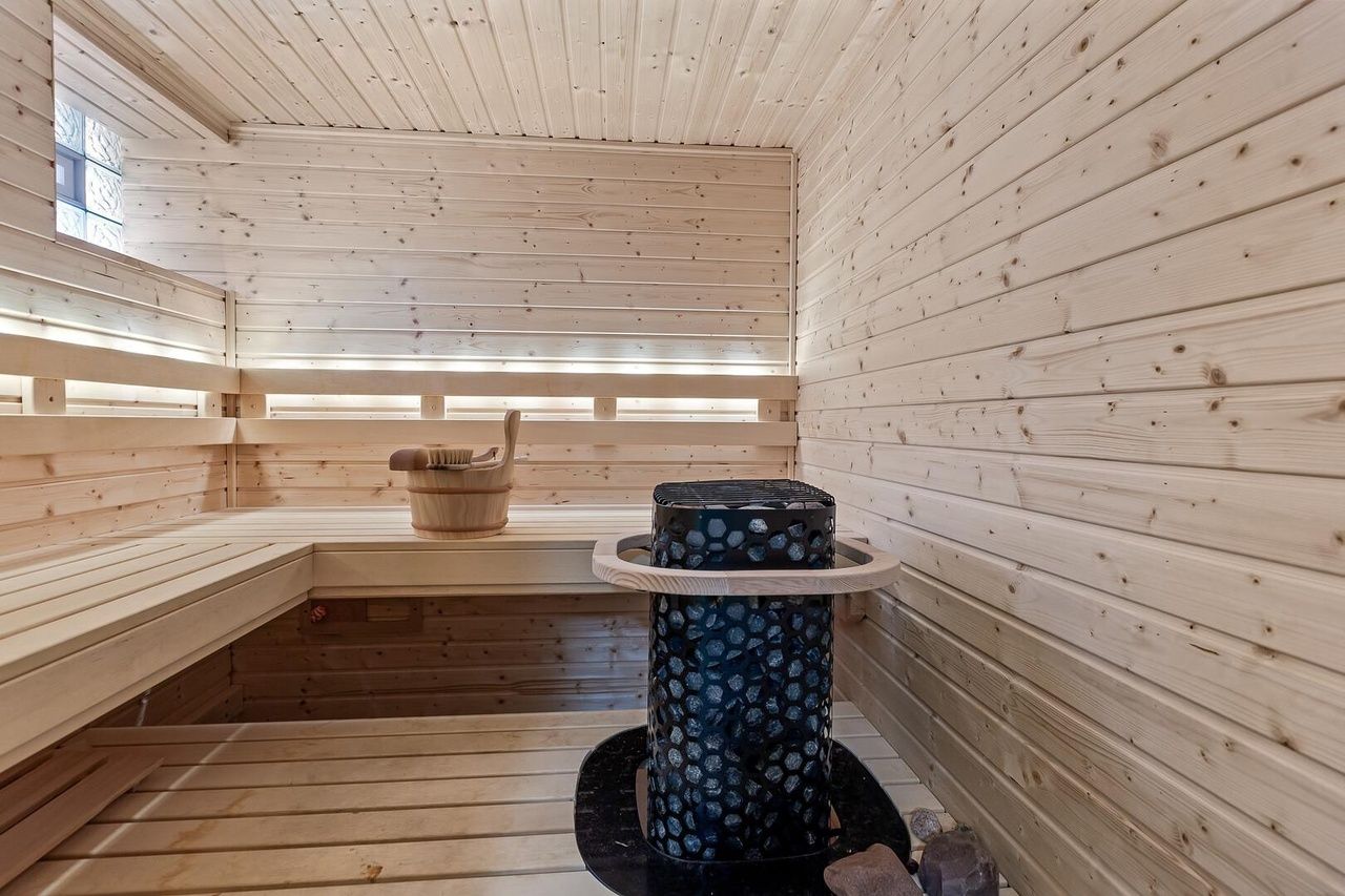 wood paneled sauna room