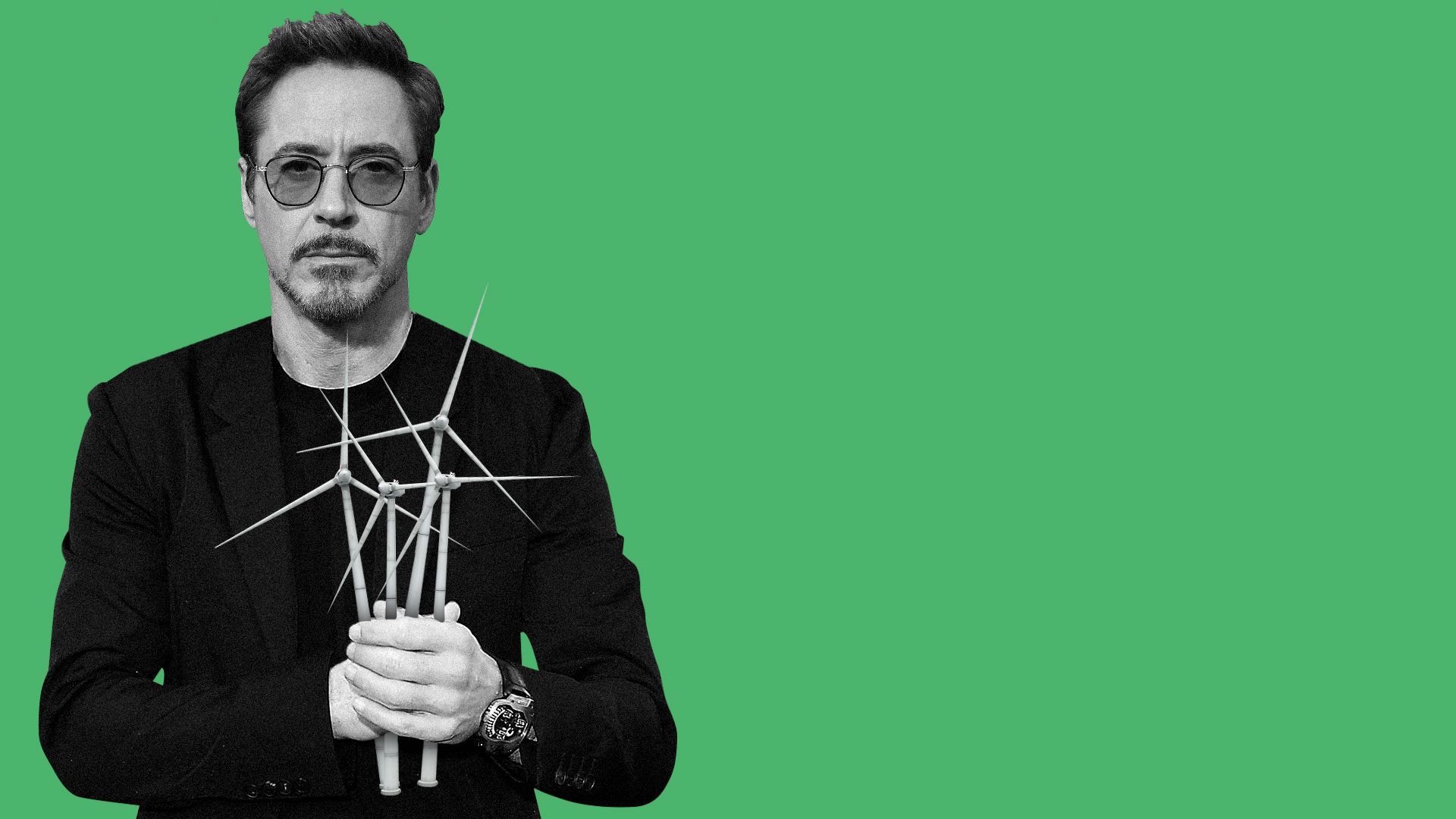 Photo illustration of Robert Downey Jr. holding wind turbines.