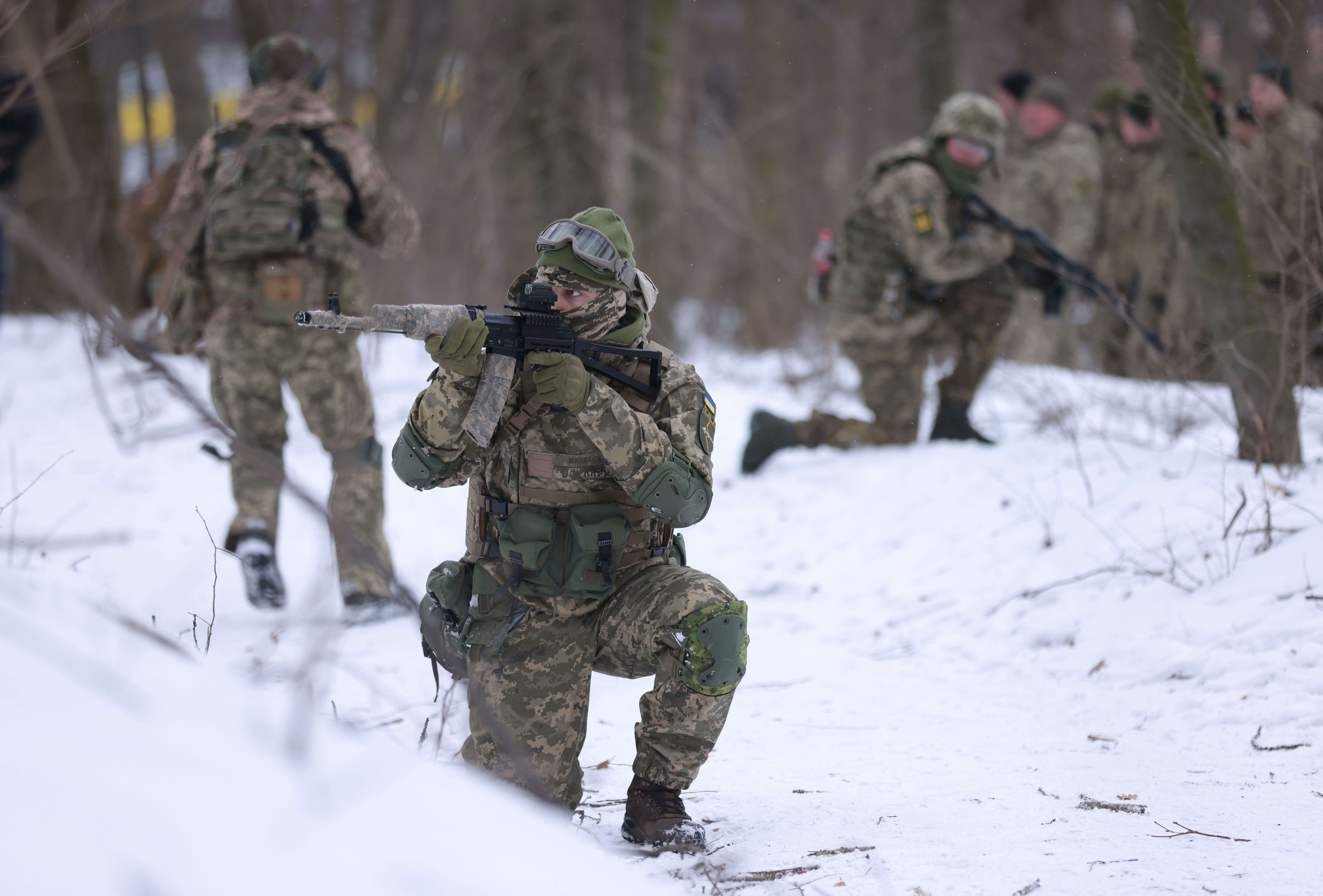 Civilian participants in a Kyiv Territorial Defence unit train on a Saturday in a forest on January 22, 2022 in Kyiv, Ukraine. 