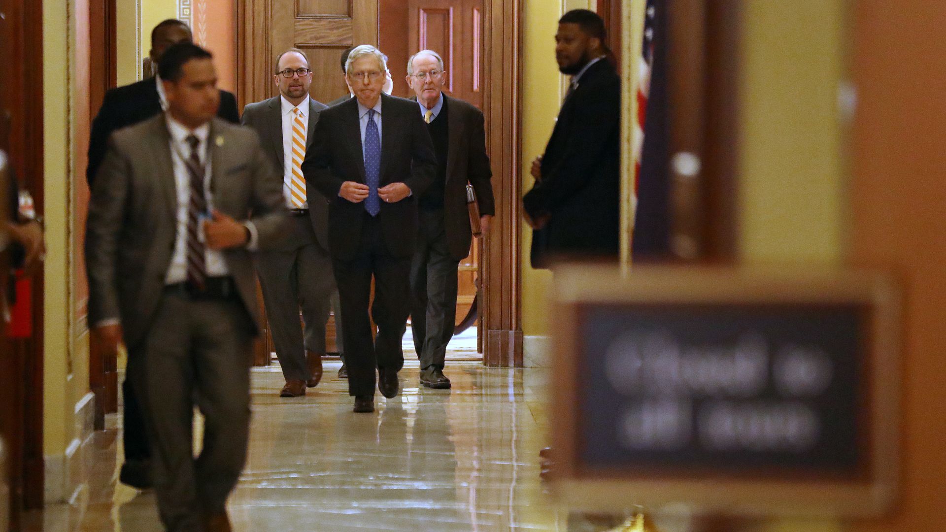 Senate Majority Leader Mitch McConnell (R-KY) (C) and Sen. Lamar Alexander (R-TN) (2nd R) leave a meeting