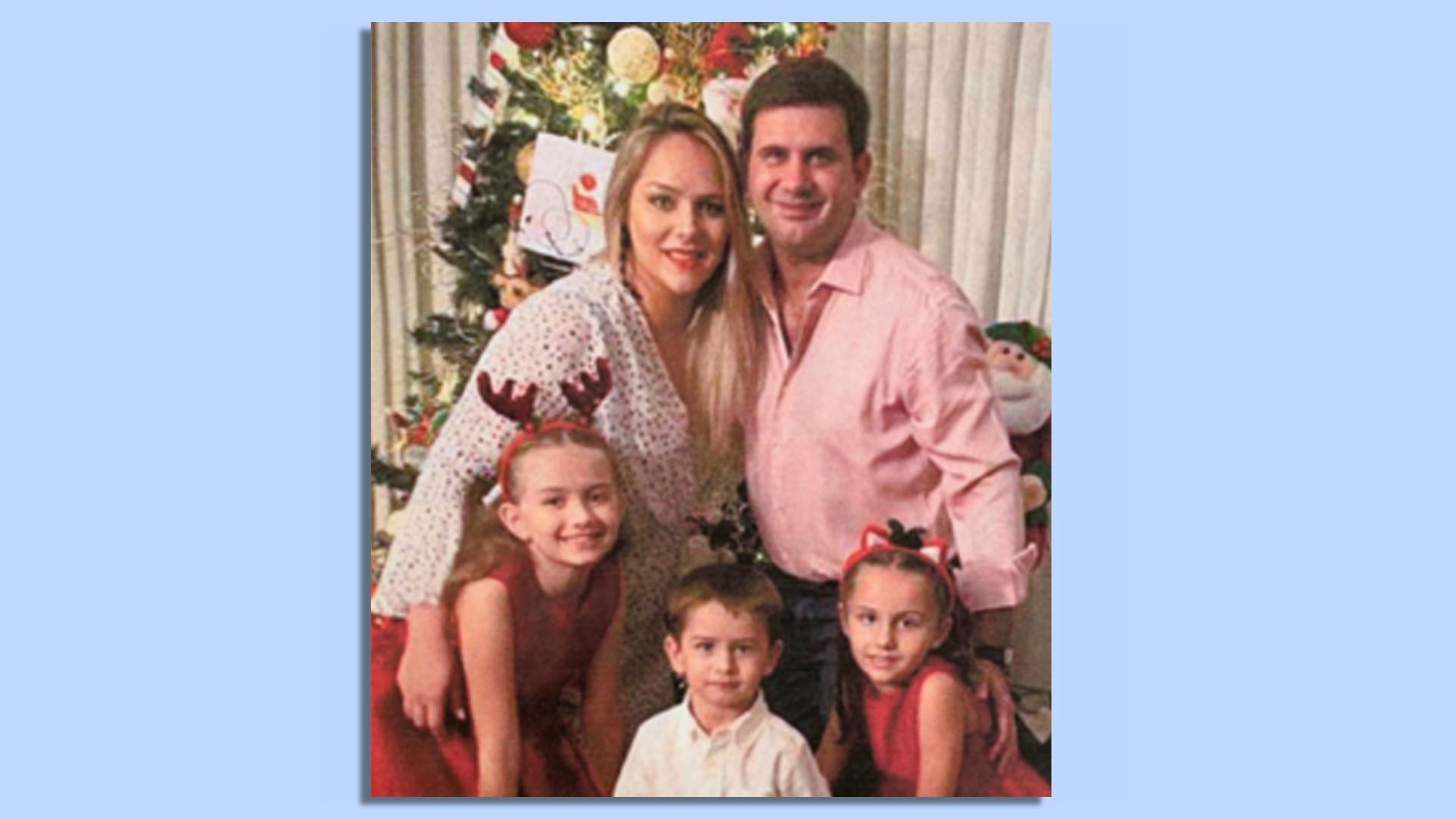 A family poses for a photo.