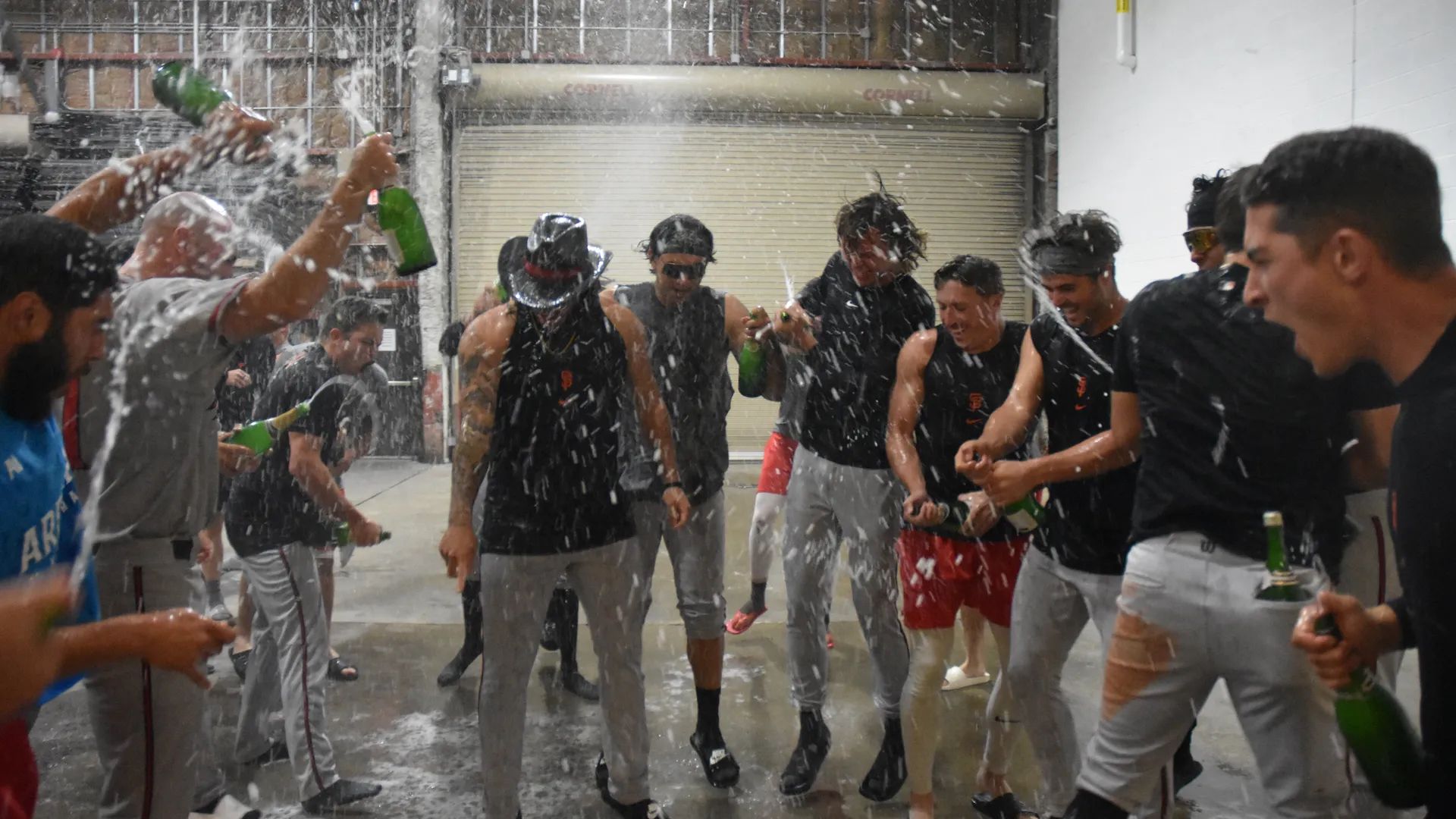 a group of guys celebrating