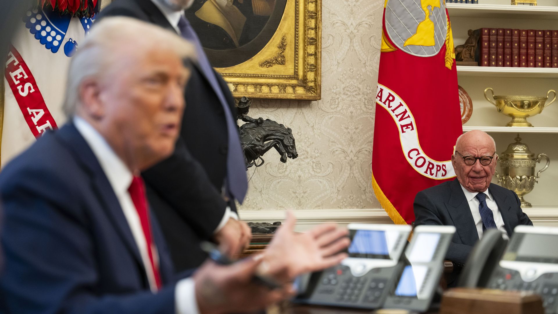 Media mogul Rupert Murdoch looks on as President Donald Trump speaks to members of the media as he signs proclamations, initiatives and appointments inside the Oval Office at the White House in Washington, DC on February 03, 2025.