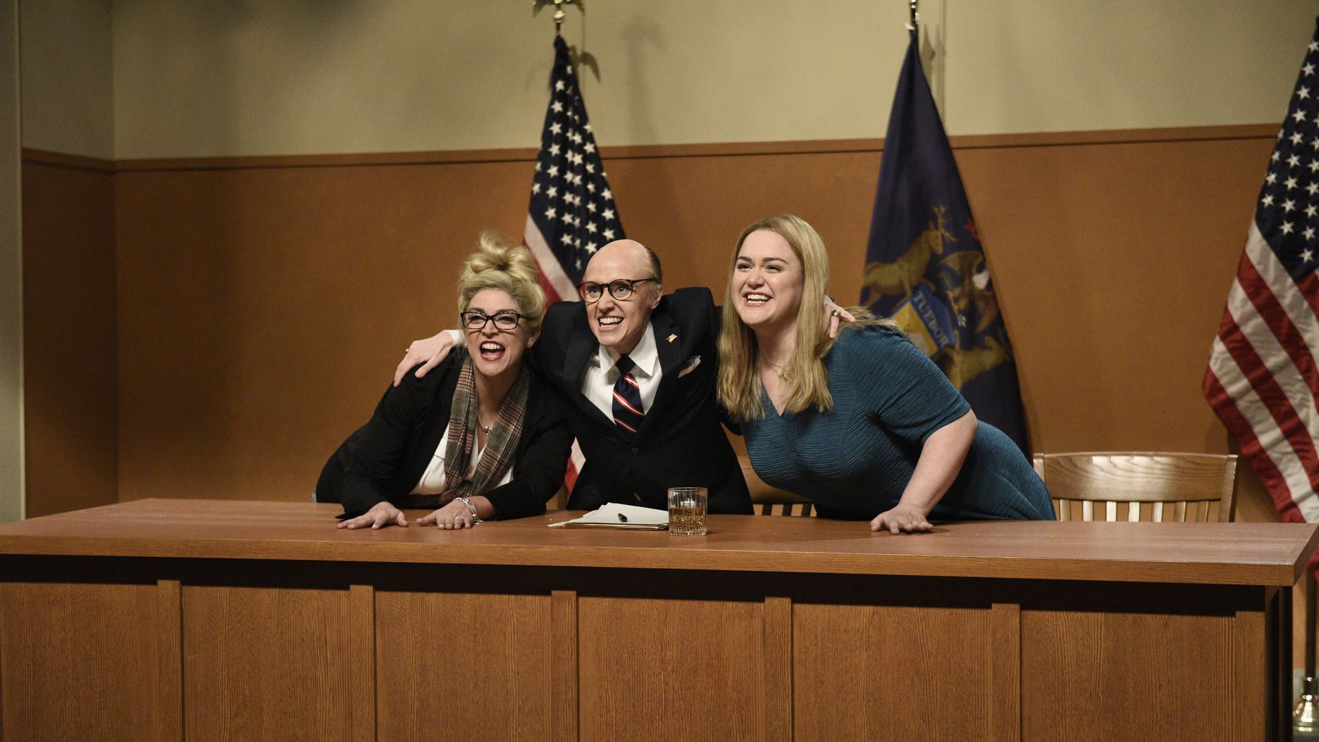 A photo of the NBC cast parodying the Michigan state legislature hearing on Rudy Giuliani's baseless election claims.