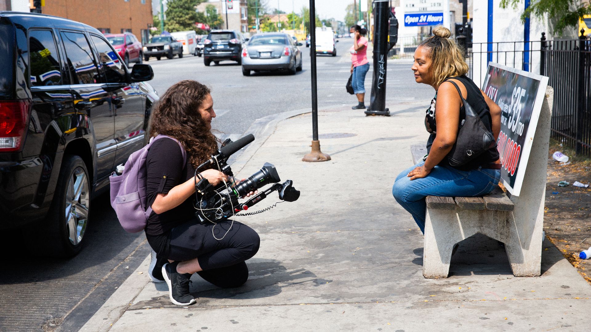 Two women on street in Chicago. 