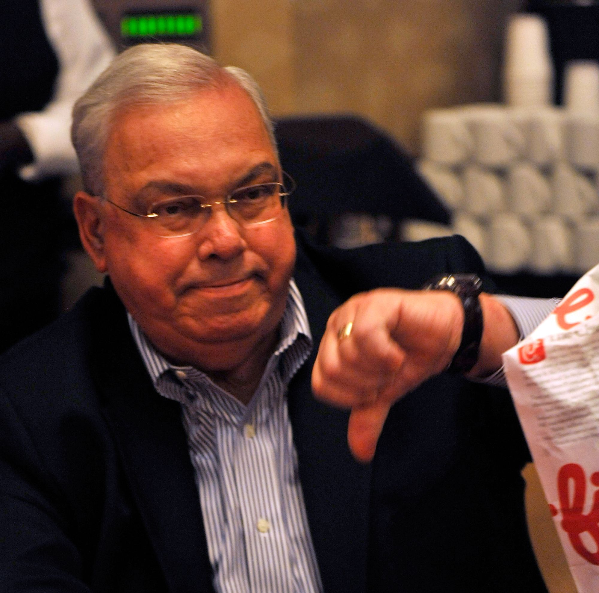 Boston Mayor Thomas M. Menino gives a thumbs-down gesture while attending an event in Boston.