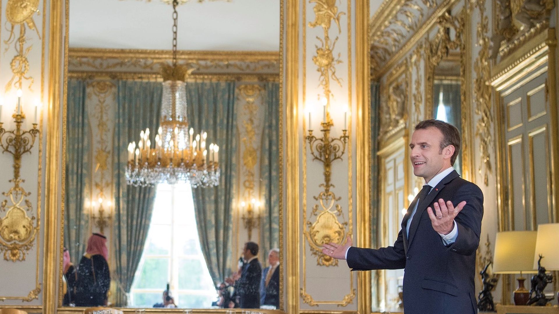 Macron in a palace dining room