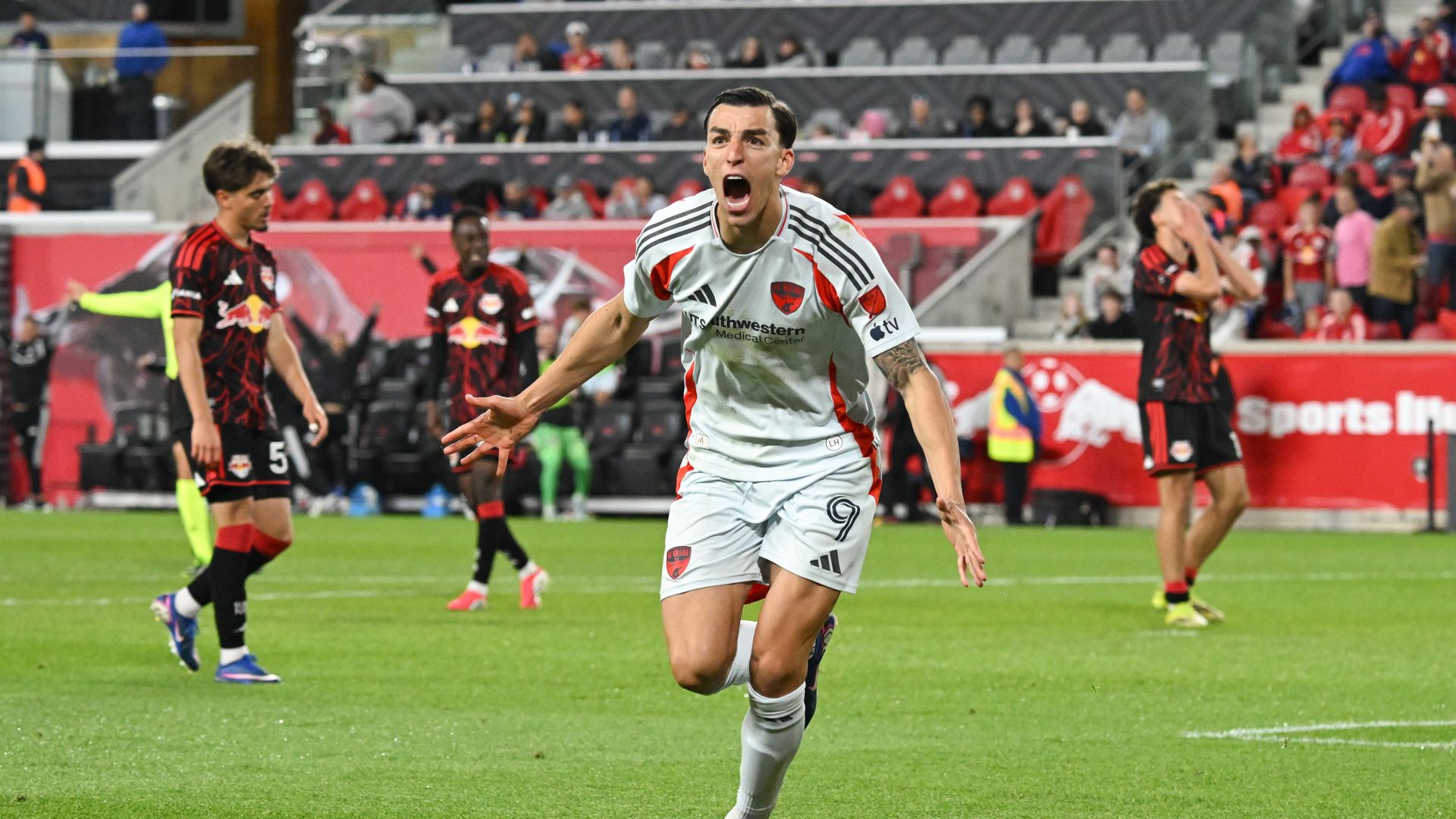 Petar Musa celebrates on the field after scoring for FC Dallas