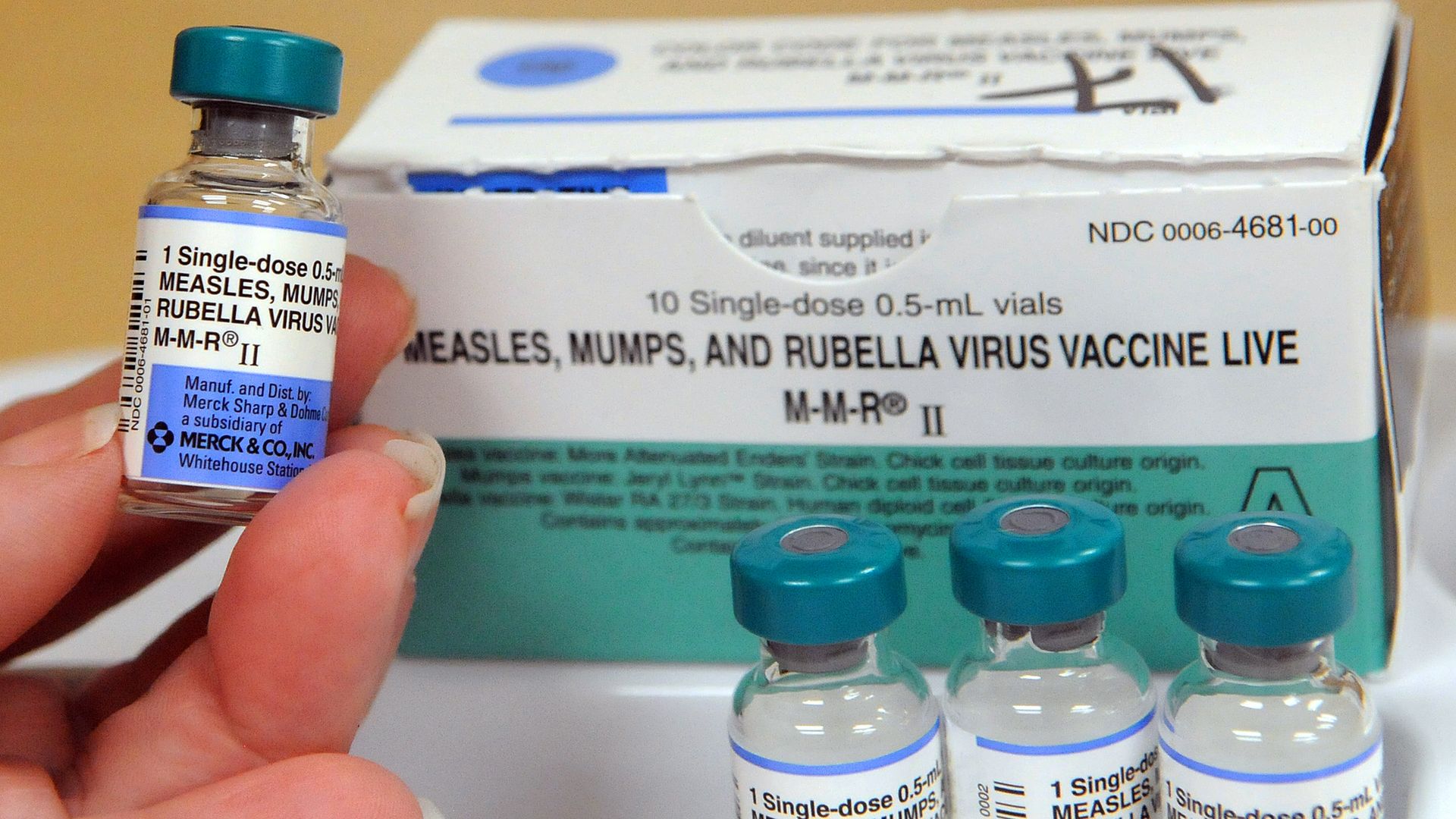 A person holding a vial of measles vaccine in Orlando, Florida, in May 2019.