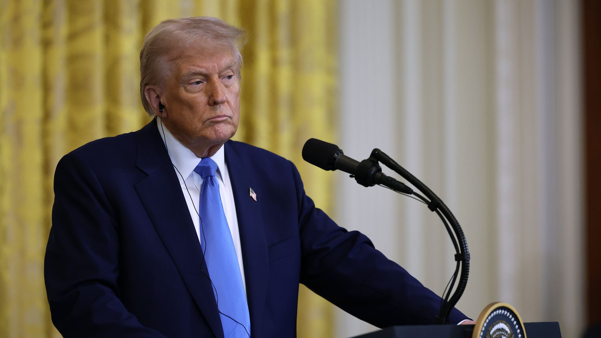 President Donald Trump listens to a reporter's question during a news conference at the White House on February 24. 