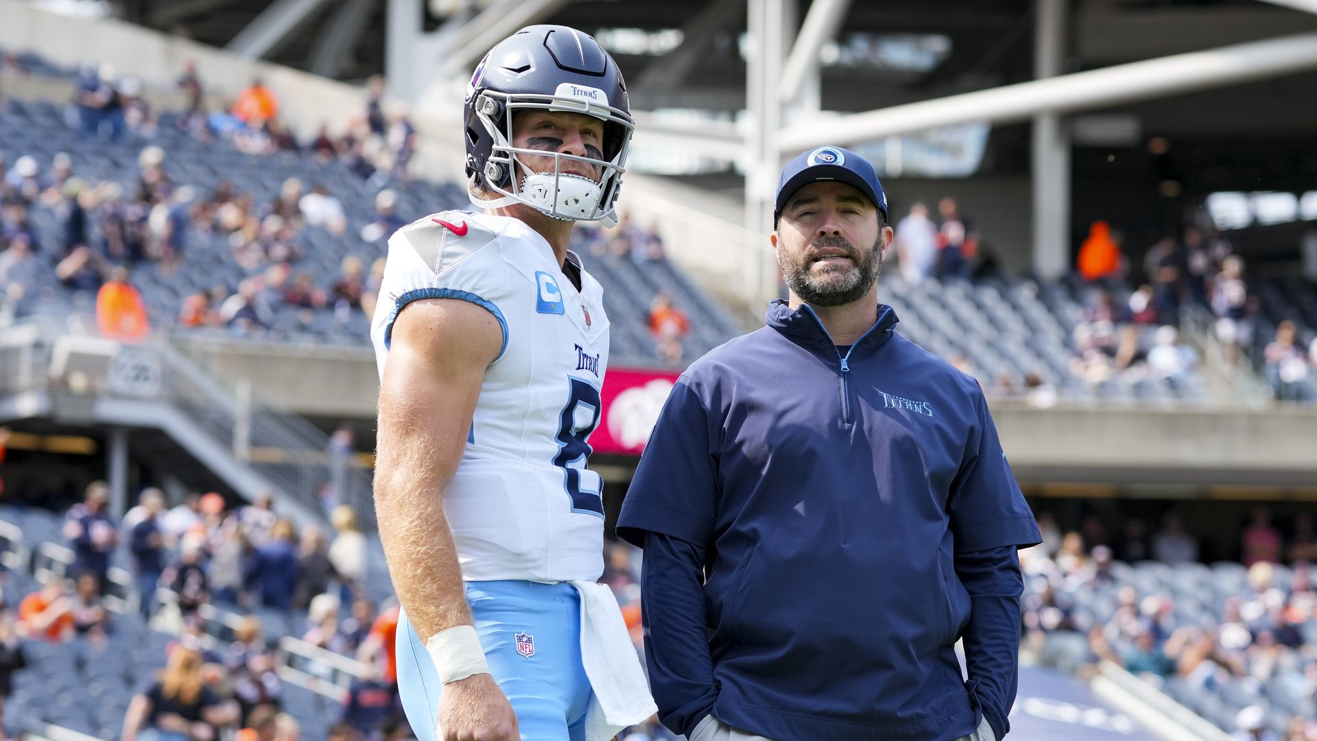 Quarterback Will Levis #8 of the Tennessee Titans and head coach Brian Callahan stand on the field prior to an NFL football game against the Chicago Bears, at Soldier Field on September 8, 2024 in Chicago, Illinois.