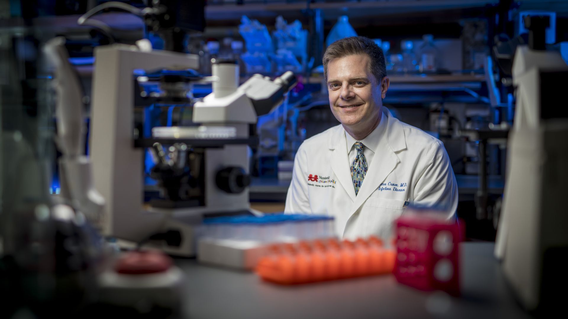 Portrait of Vanderbilt Vaccine Center director James Crowe sitting in a lab.