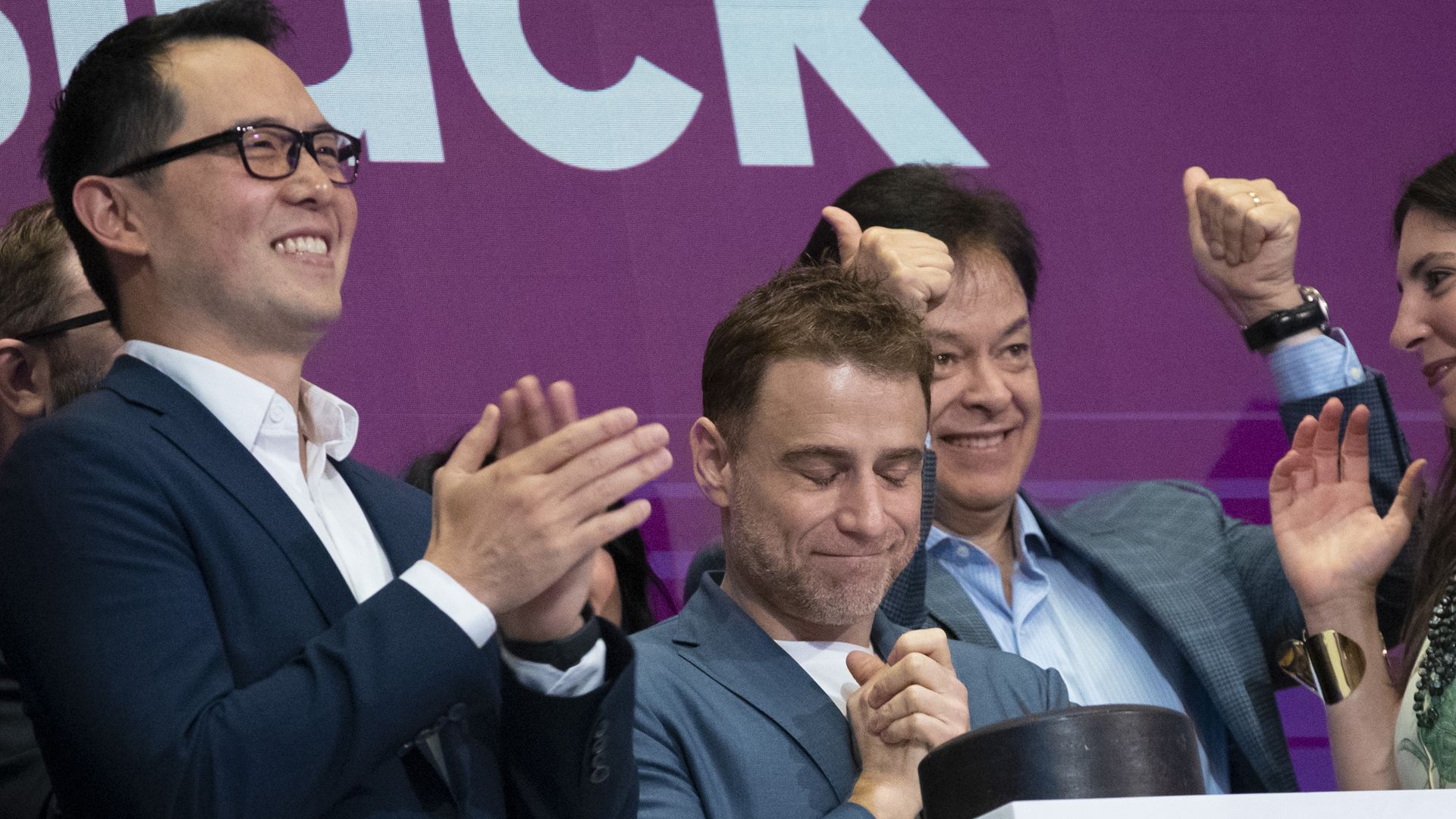 CFO Allen Shim, CEO Stewart Butterfield celebrate Slack's IPO