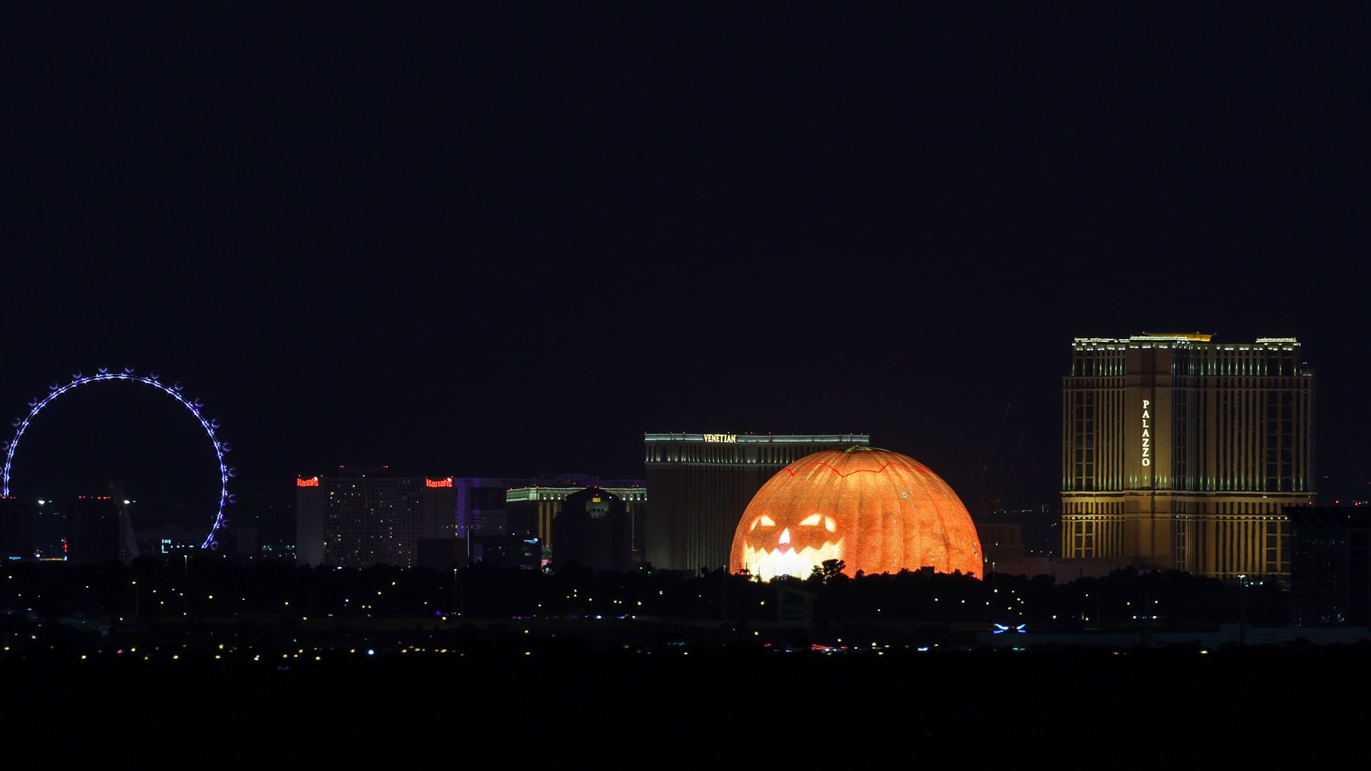 LAS VEGAS, NEVADA - OCTOBER 14: (L-R) The High Roller at The Linq Promenade, Harrah's Las Vegas, The Venetian Resort Las Vegas, Sphere, lit up as a jack-o'-lantern, and The Palazzo at The Venetian Resort Las Vegas are shown on the Las Vegas Strip on October 14, 2024 in Las Vegas, Nevada. (Photo by E