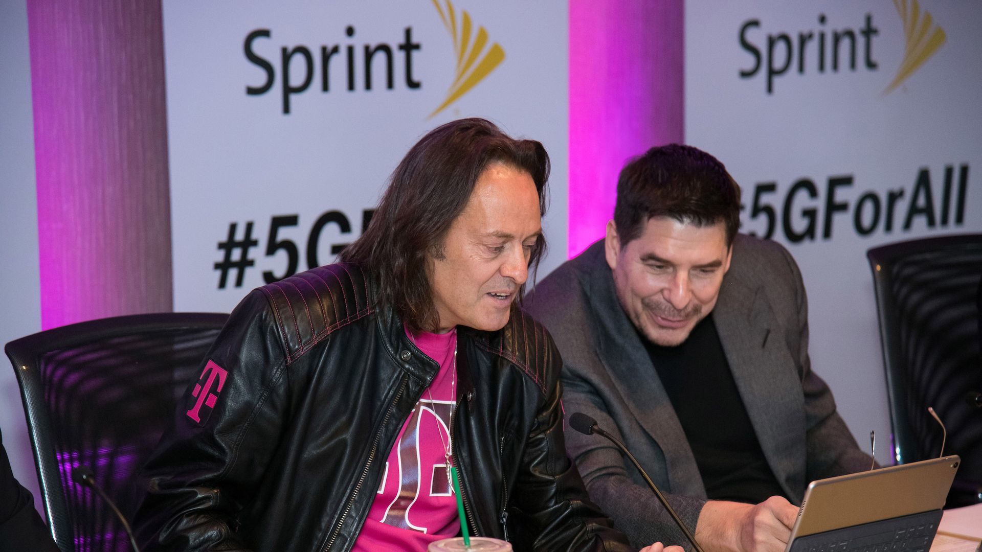 Sprint CEO Marcelo Claure (right), seen here with T-Mobile CEO John Legere.