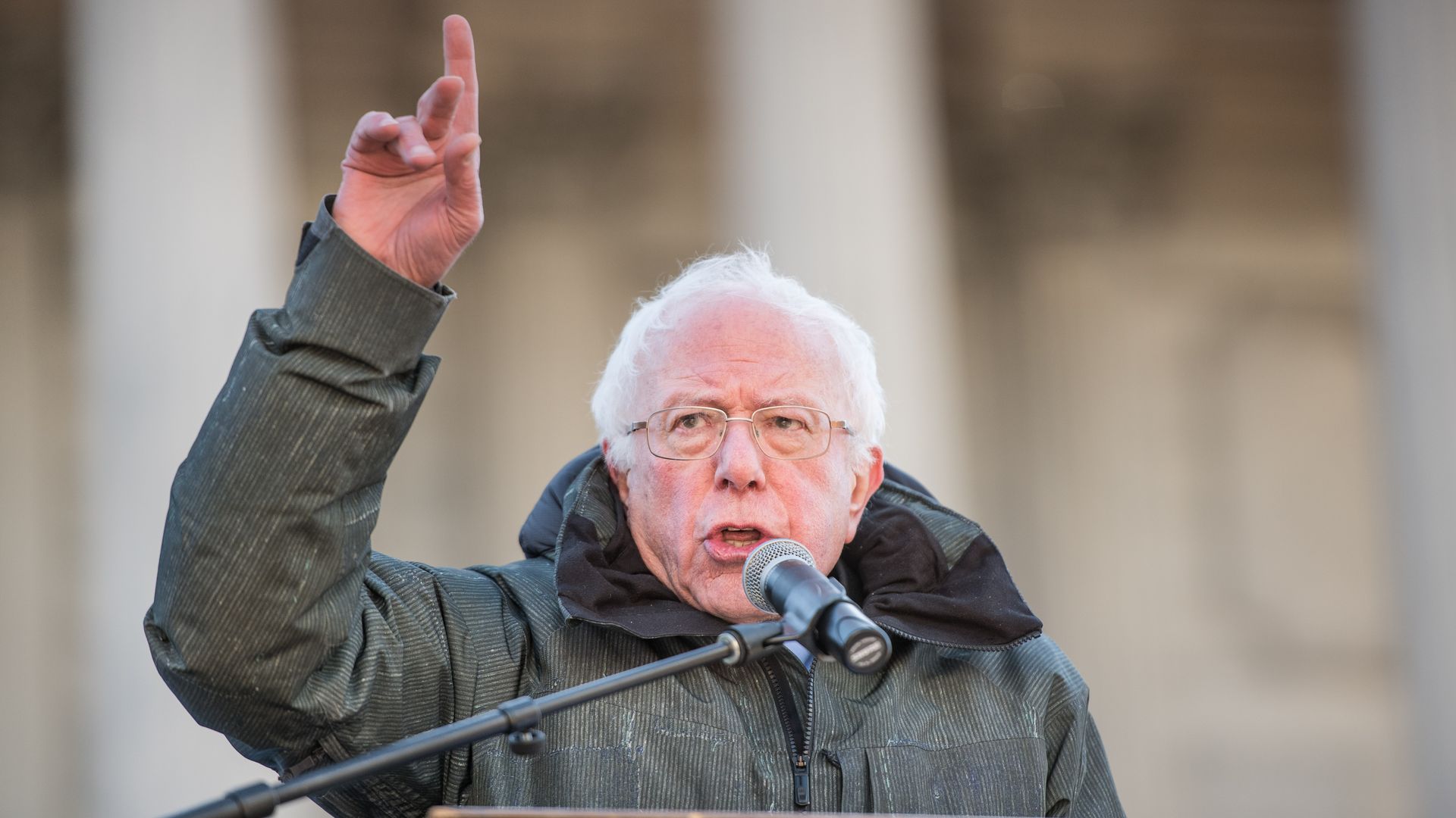 Photo of Sen. Bernie Sanders speaking at a podium
