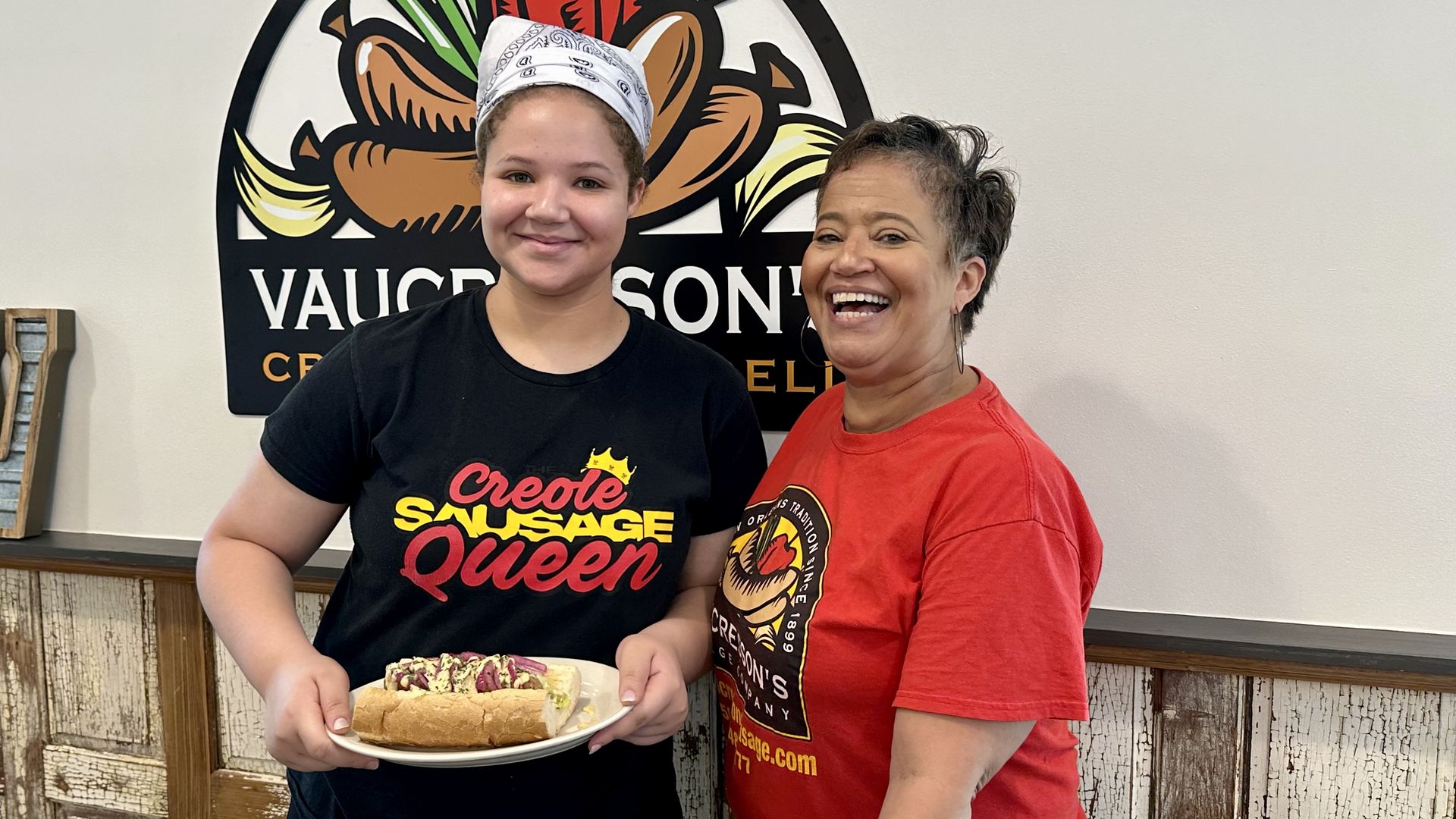 Photo shows the owners of Vaucresson's Cafe in Treme with a poboy.