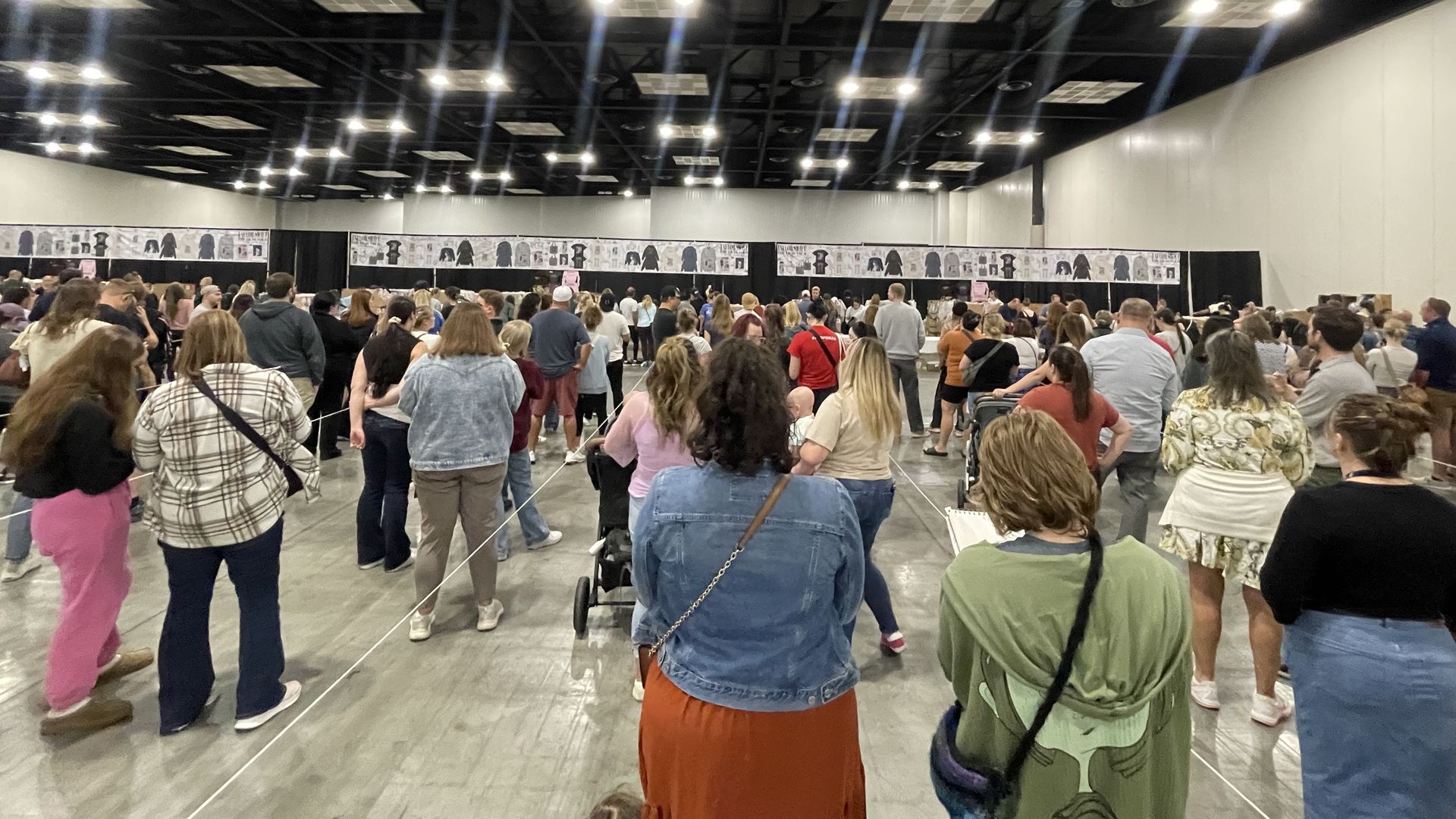 lines of people waiting for taylor swift merch