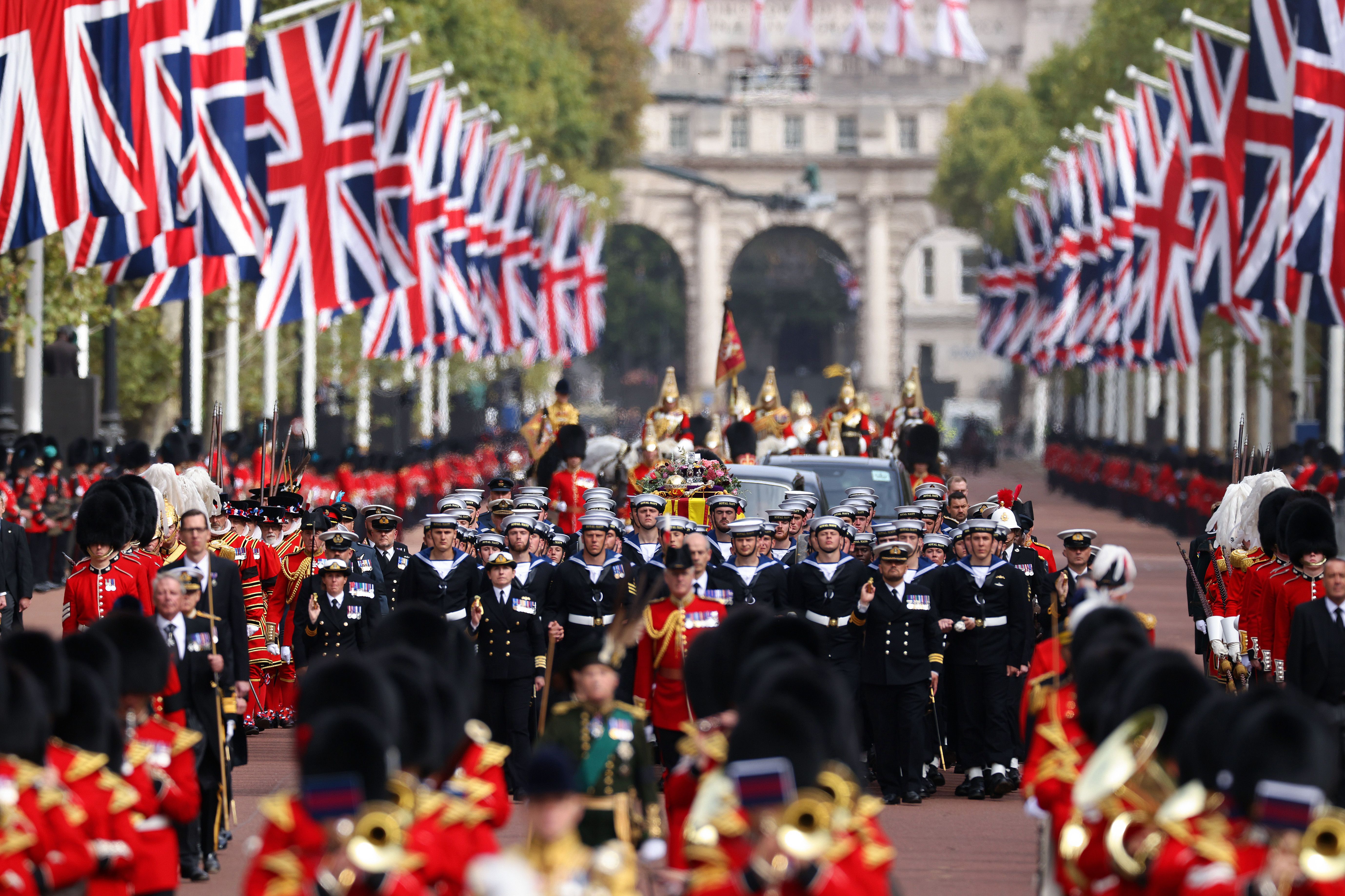 The Coldstream Guards travel along The Mall on September 19, 2022 in London, England.
