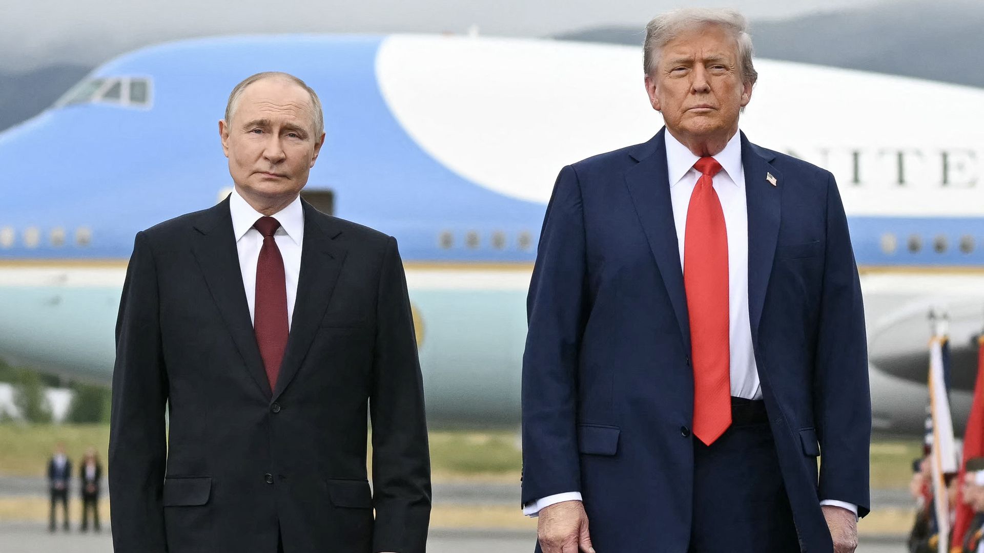 US President Donald Trump (R) and Russian President Vladimir Putin pose after arrival at Joint Base Elmendorf-Richardson in Anchorage, Alaska, on August 15, 2025.
