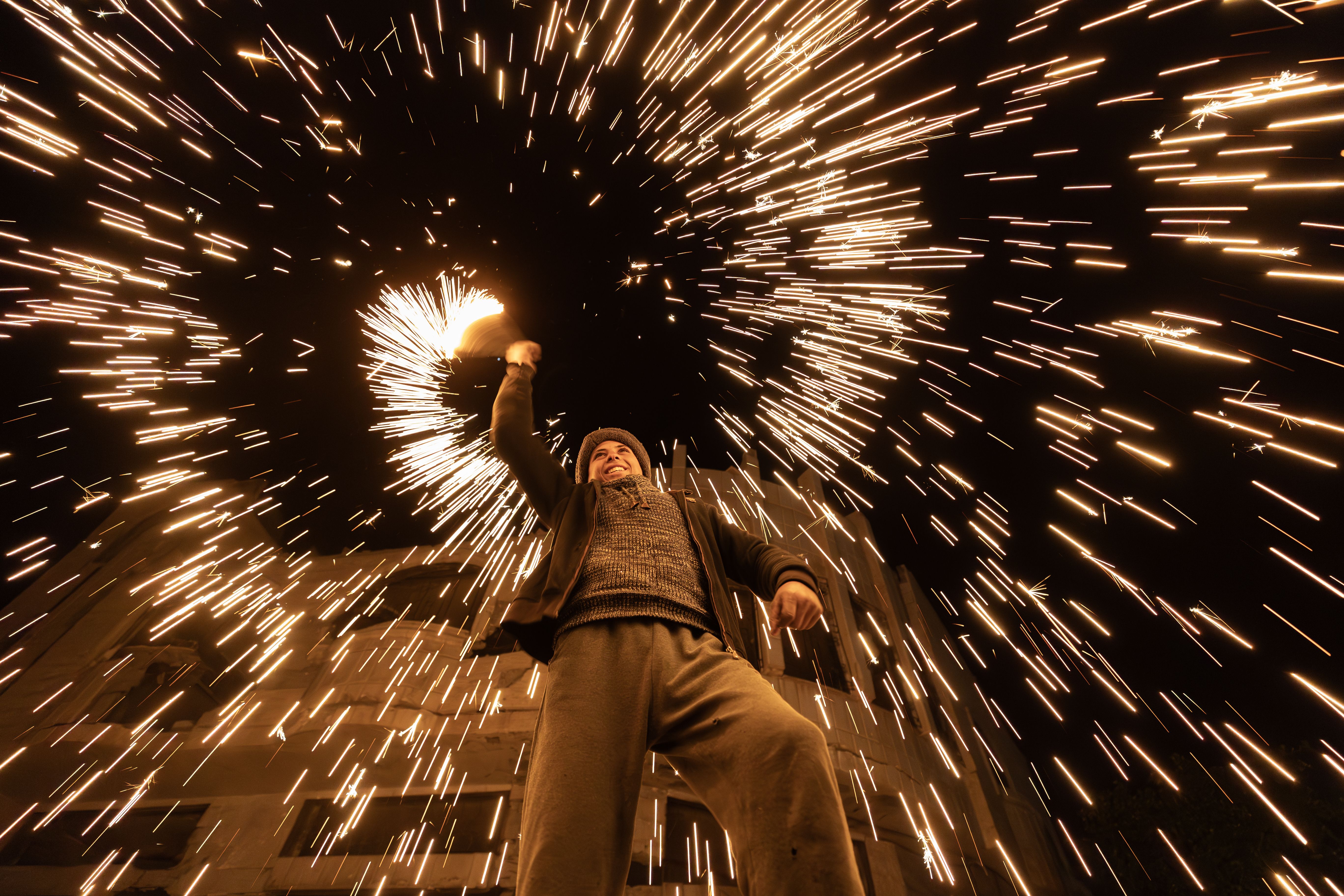 A group of Palestinians in Gaza City, located in the northern Gaza Strip, celebrate the arrival of the holy month of Ramadan by sparking 'a spark' on March 1