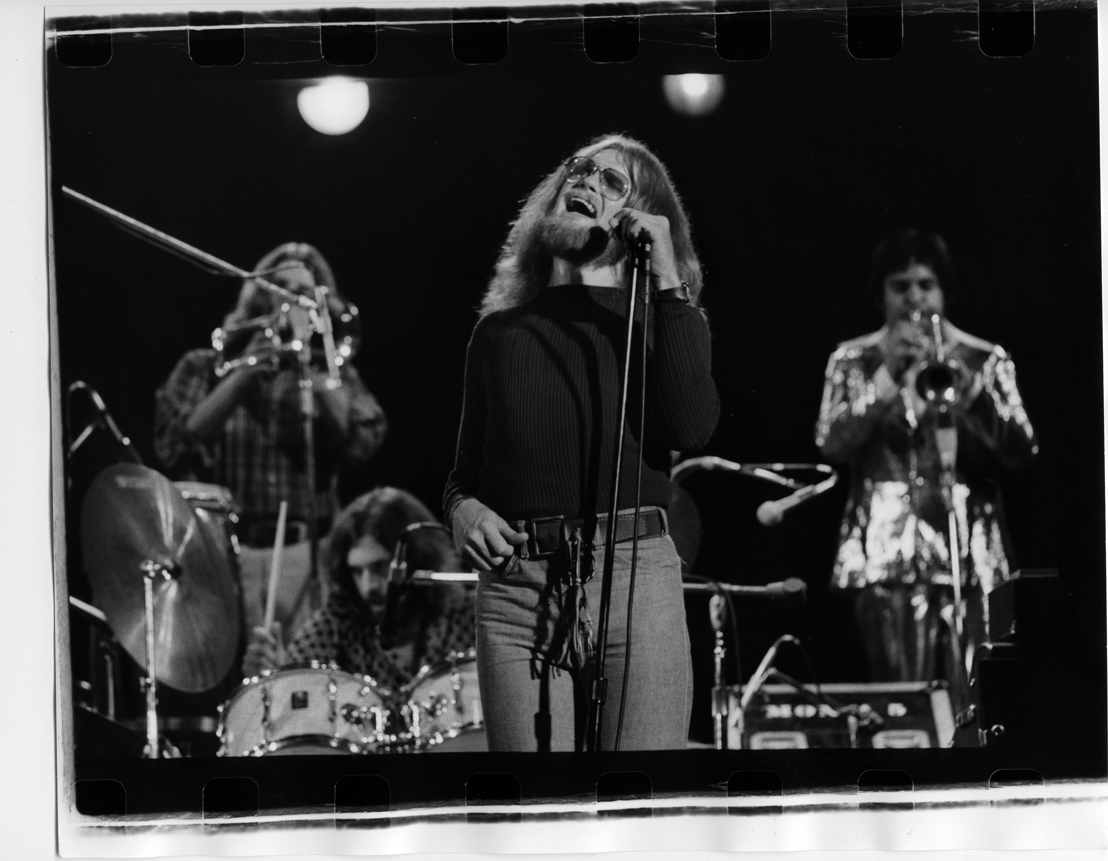 The band Blood, Sweat & Tears performs on stage in the 1970s.