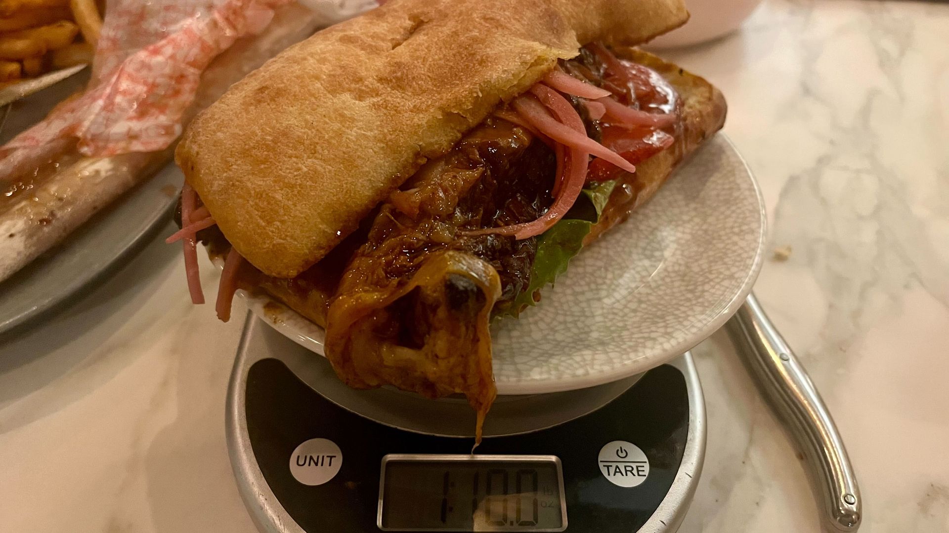 The sandwich weighed on my scale, showing 1.625lbs