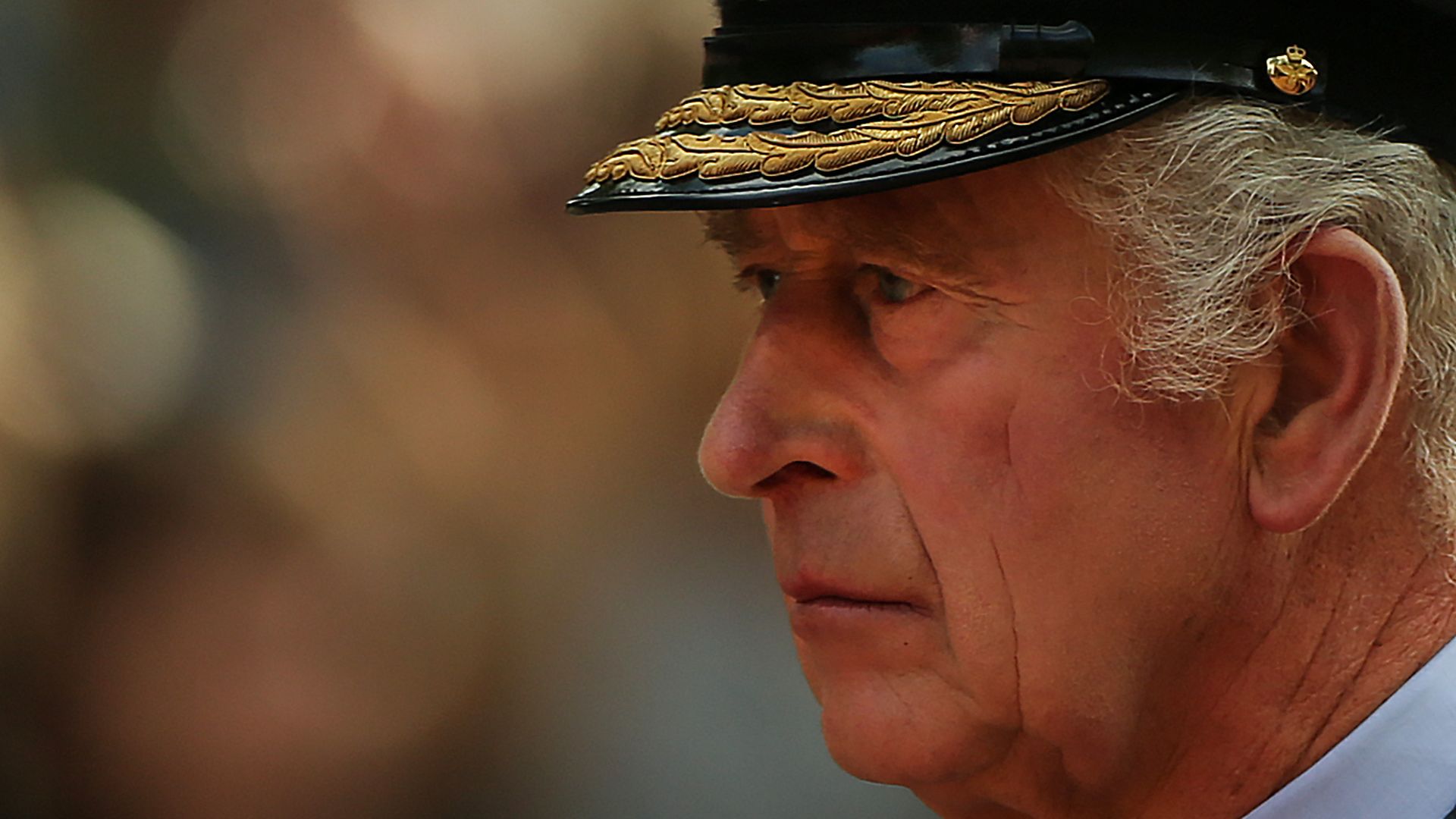 Britain's King Charles III walks behind the coffin of Queen Elizabeth II.