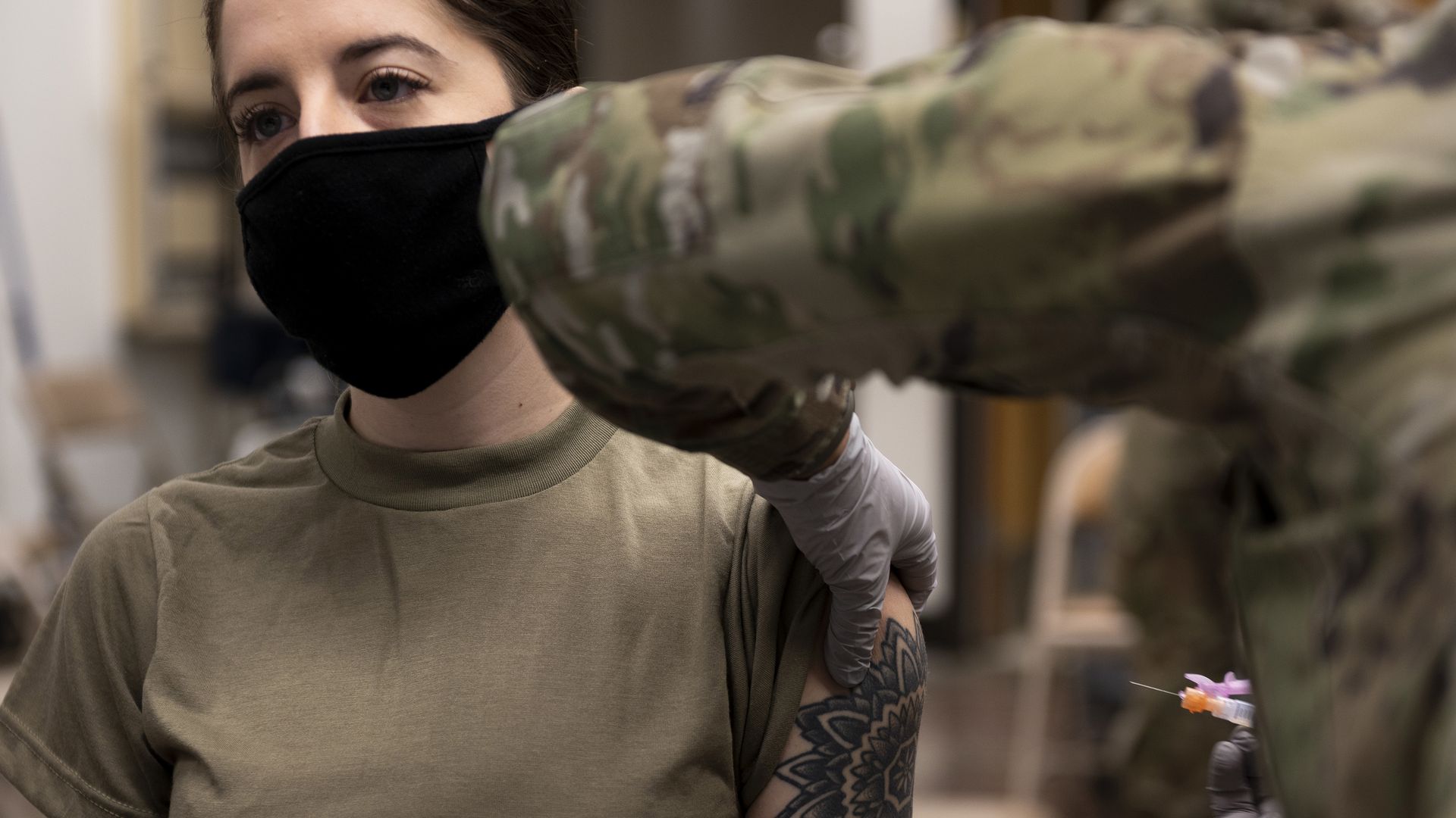 U.S. Air Force member receives a dose of the Moderna COVID-19 vaccine