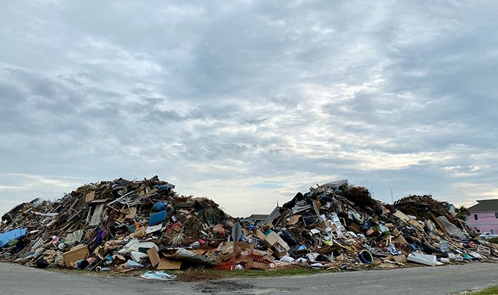 debris from homes on Ocean Isle Beach following Hurricane Isaias in 2020