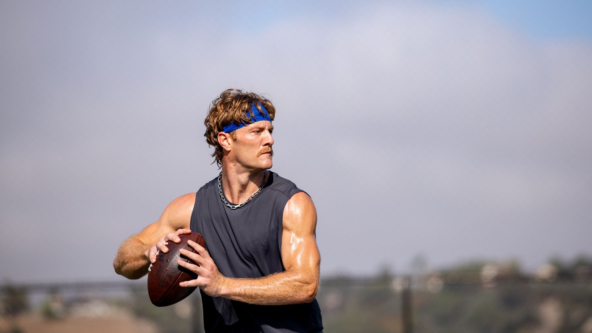 Quarterback Will Levis #8 of the Tennessee Titans working out with Quarterback coach Jordan Palmer during an offseason workout at a Park on July 16, 2026 in Orange County.