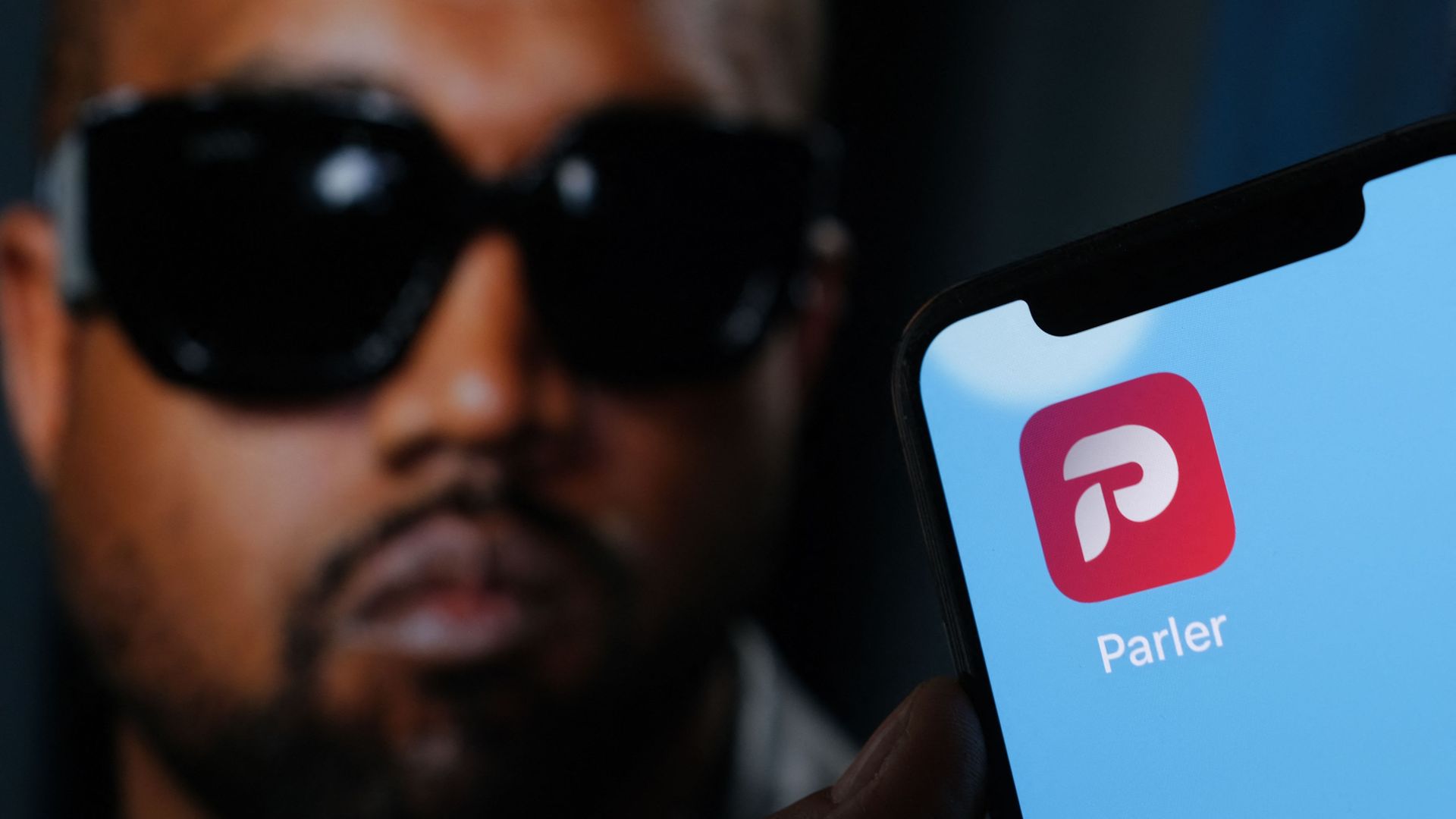 Kanye West and a Parler logo