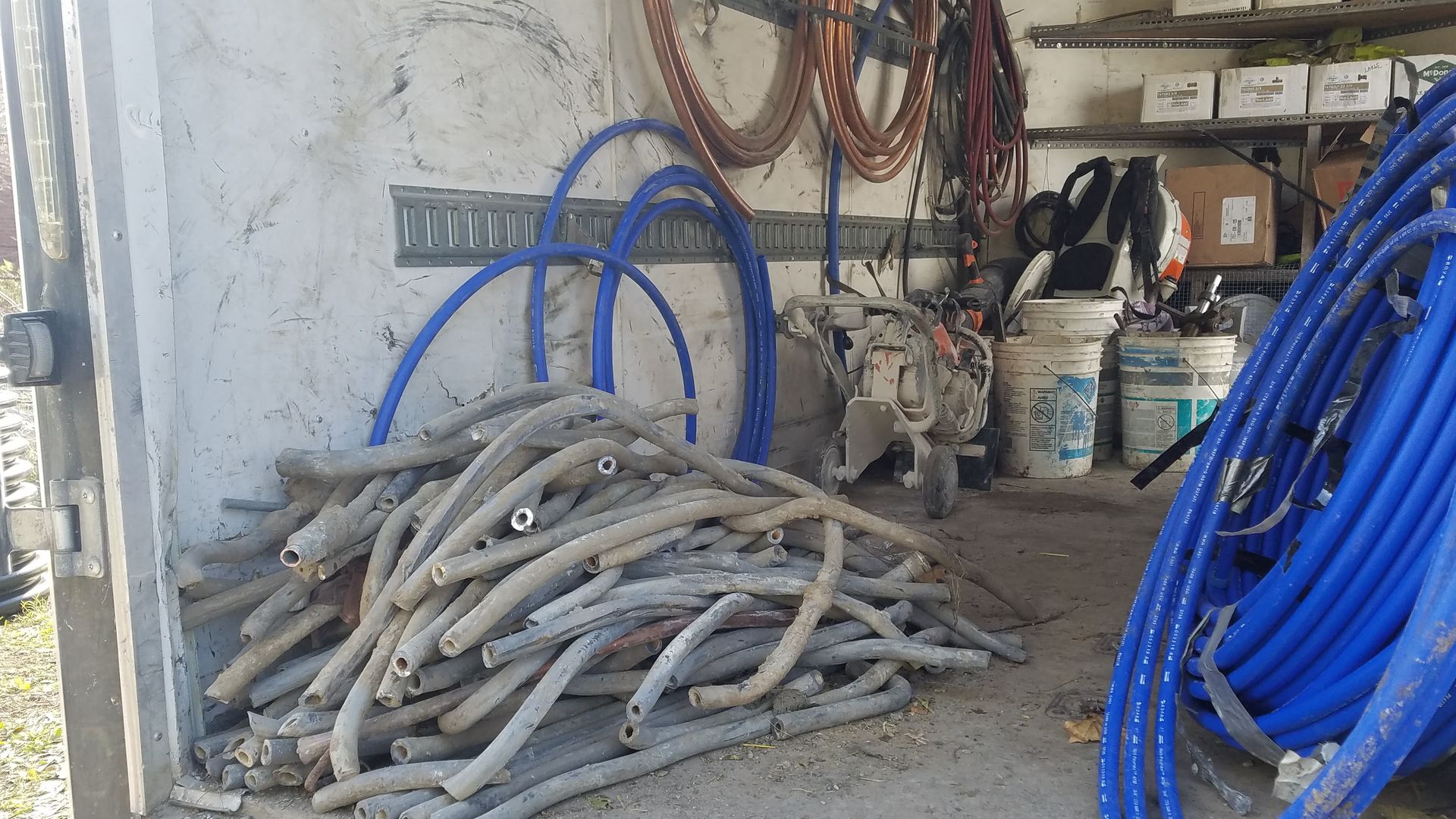 pile of lead pipes