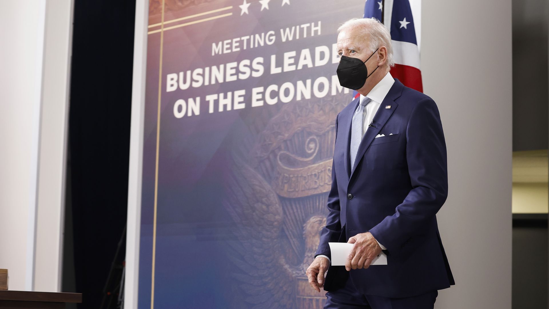 President Joe Biden arrives to a meeting.