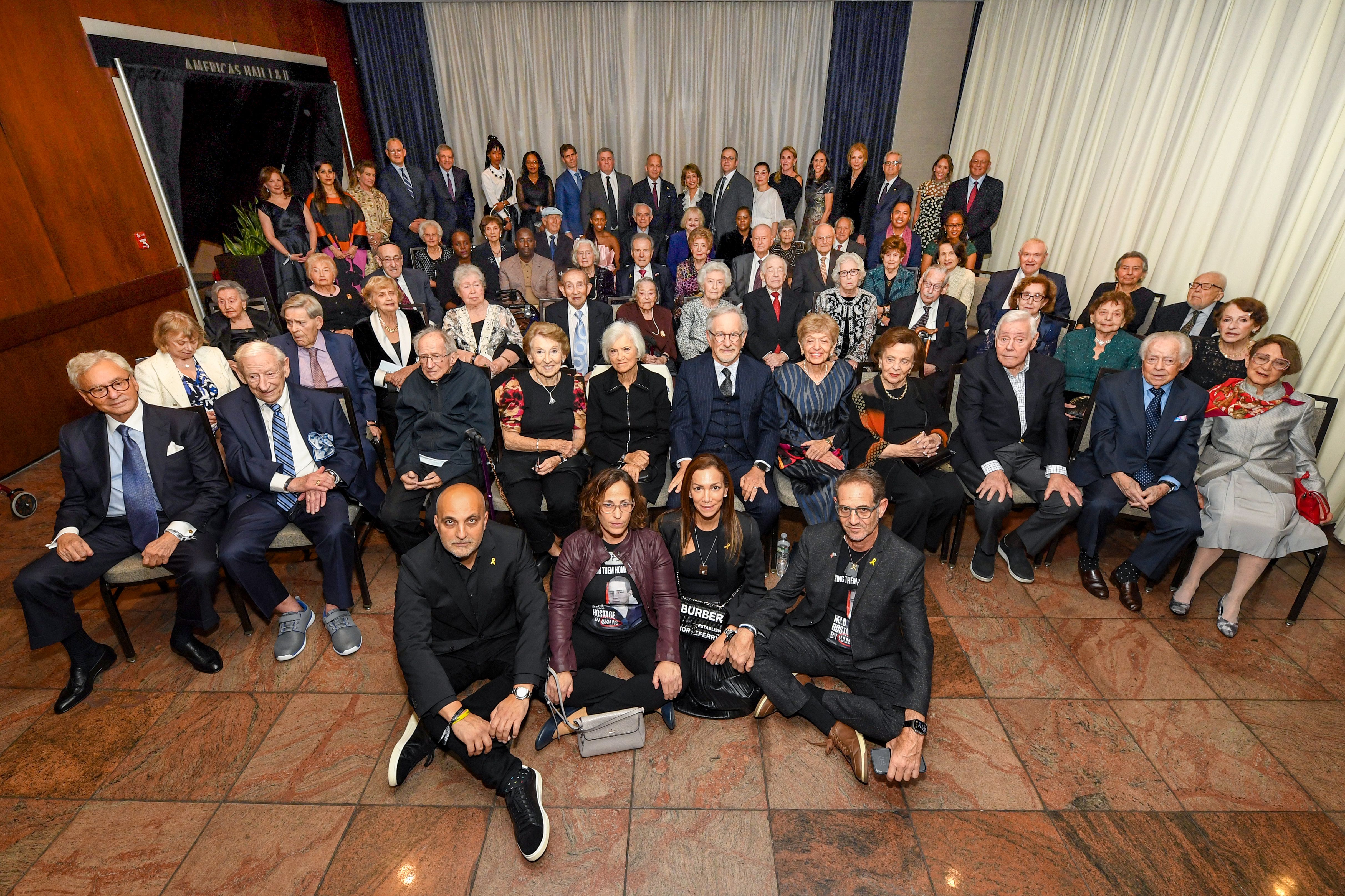 Steven Spielberg poses with Holocaust survivors as the USC Shoah Foundation Hosts the 30th Anniversary Gala "Ambassadors For Humanity" at the New York Hilton on October 13, 2024, in New York City.