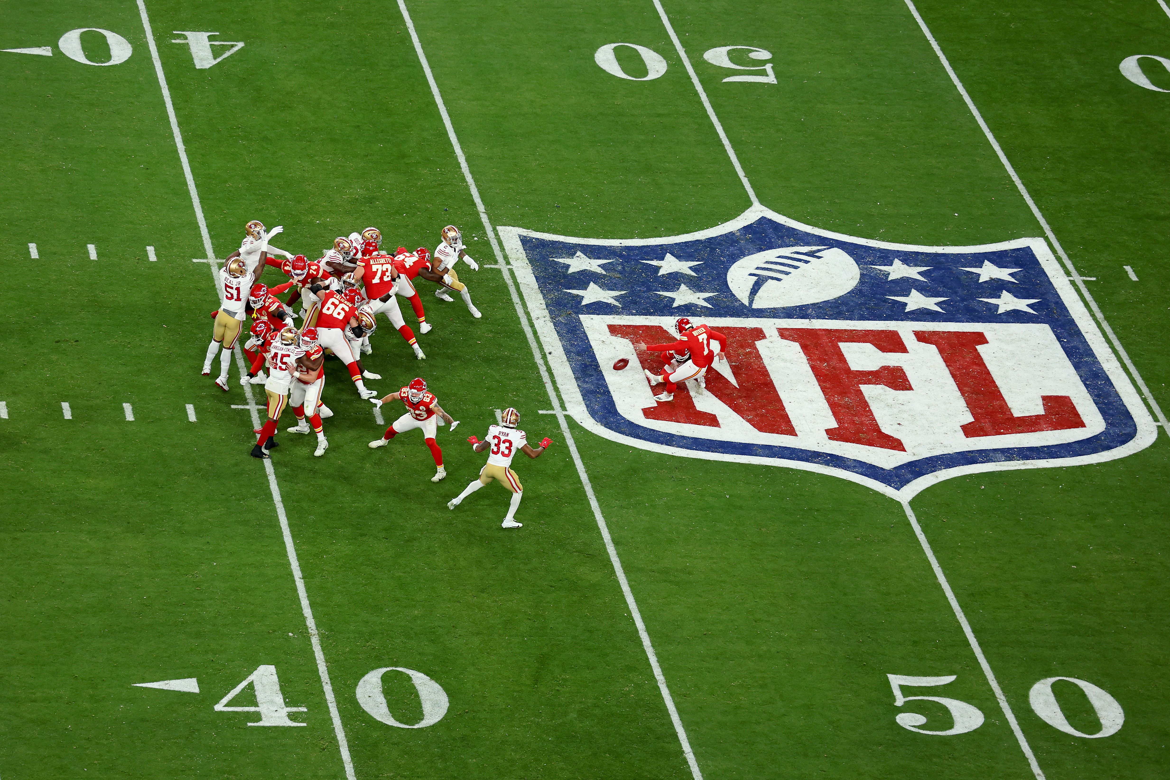 Harrison Butker #7 of the Kansas City Chiefs kicks a  57-yard field goal in the third quarter against the San Francisco 49ers during Super Bowl LVIII — breaking a record set earlier in the game at Allegiant Stadium on Sunday, Feb. 11 in Las Vegas, Nevada. 