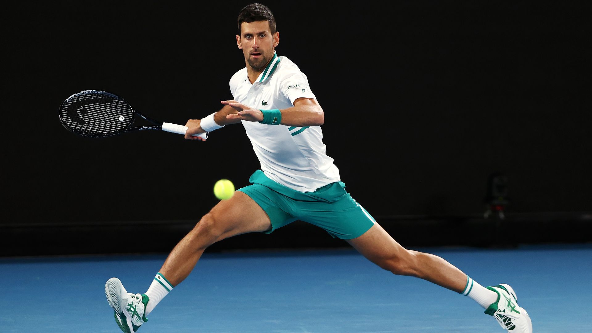 Novak Djokovic plays at the 2021 Australian Open.