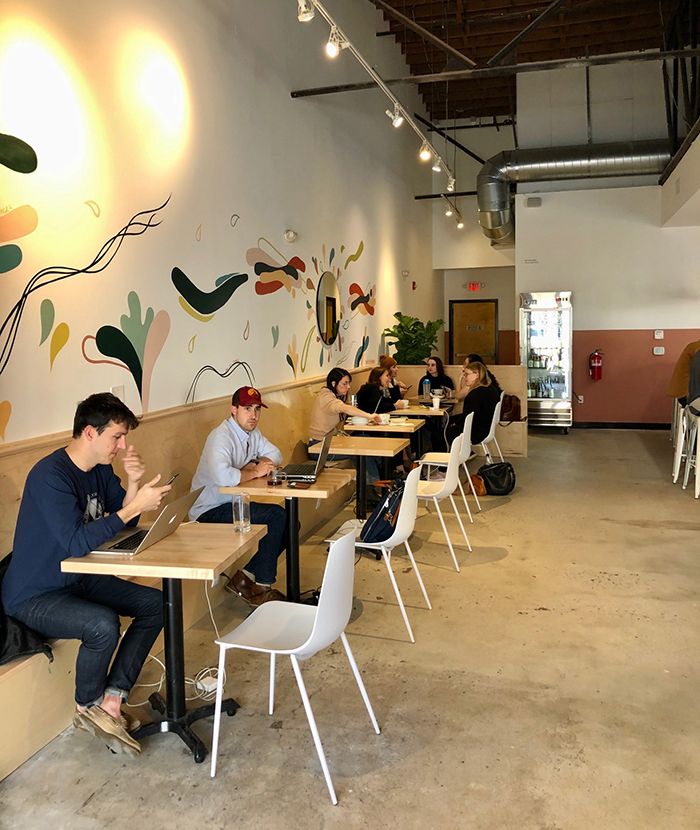 All day at this Villa Heights coffee and bottle shop, the bar is lined with laptop workers sipping pour - overs and specialty lattes. Plus, there’s plenty of comfy seating for a casual meeting or creative work session.