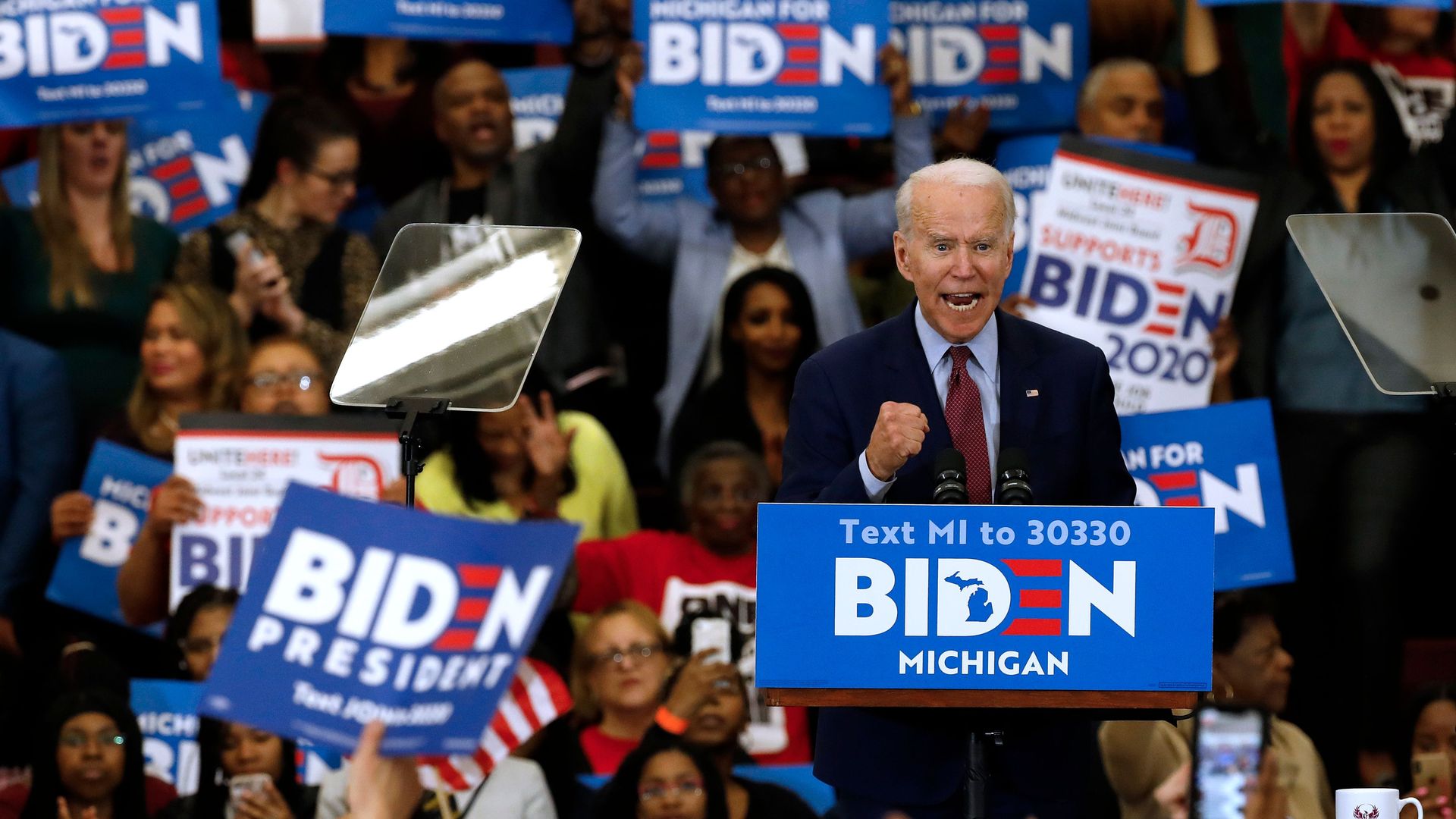 Democratic presidential candidate former Vice President Joe Biden gestures as he speaks during a campaign rally at Renaissance High School in Detroit, Michigan on March 9