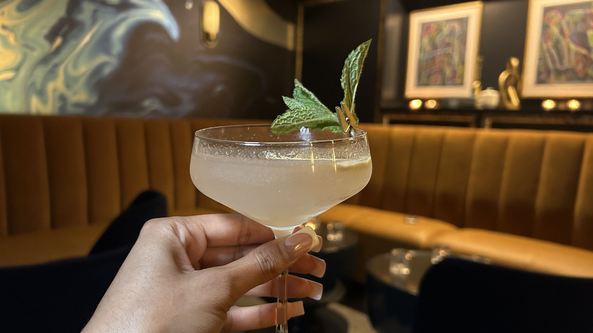 hand holding cocktail