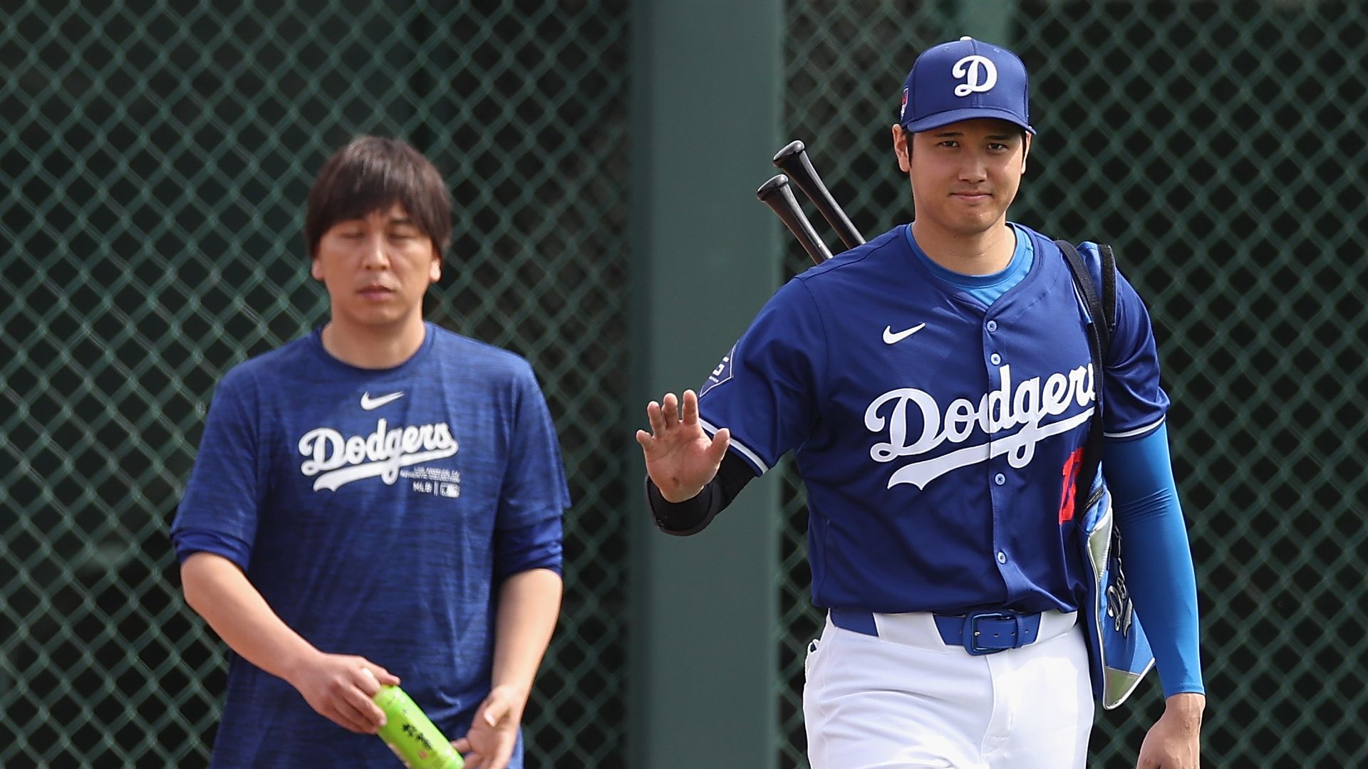 Shohei Ohtani #17 of the Los Angeles Dodgers and interpreter Ippei Mizuhara arrive to a game against the Chicago White Sox at Camelback Ranch on February 27, 2024 in Glendale, Arizona. (Photo by Christian Petersen/Getty Images)