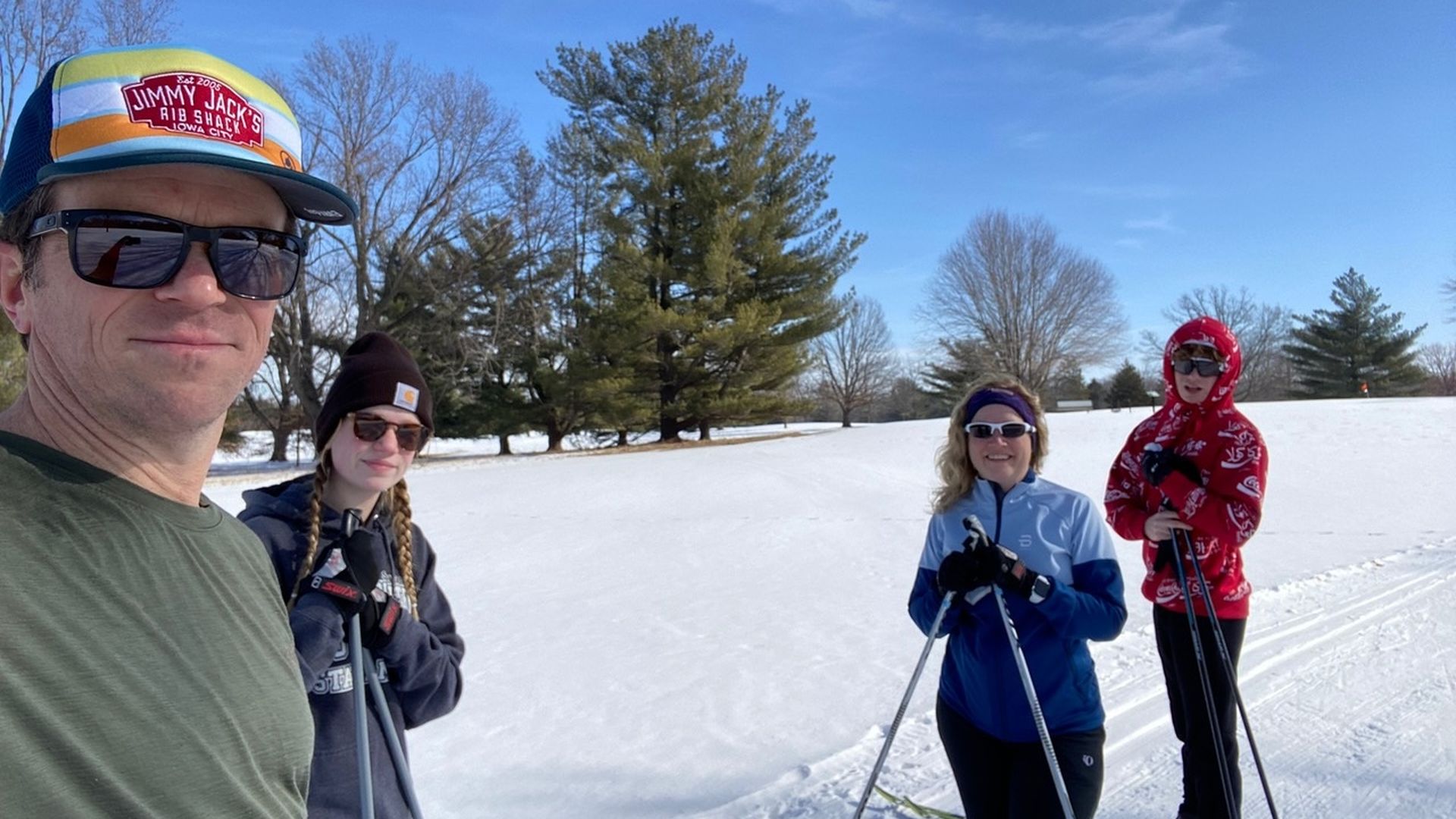 Marc Hollander with his family skiing in Jester Park